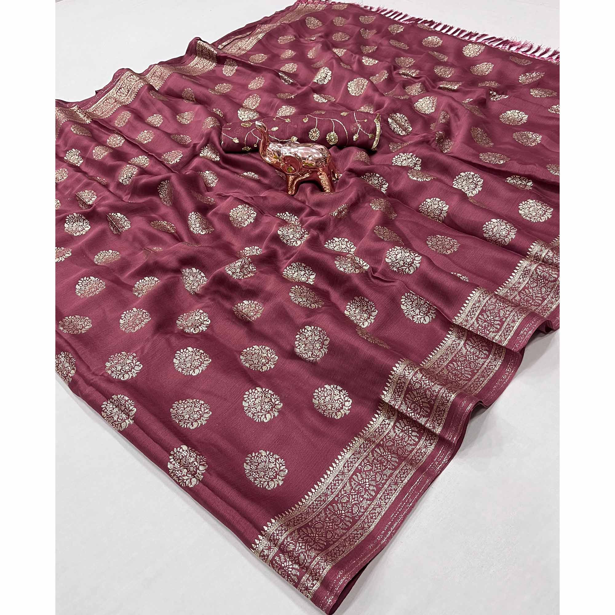 Elegant Mauve Foil Floral Printed Georgette Saree With Tassel Detailing Pallu