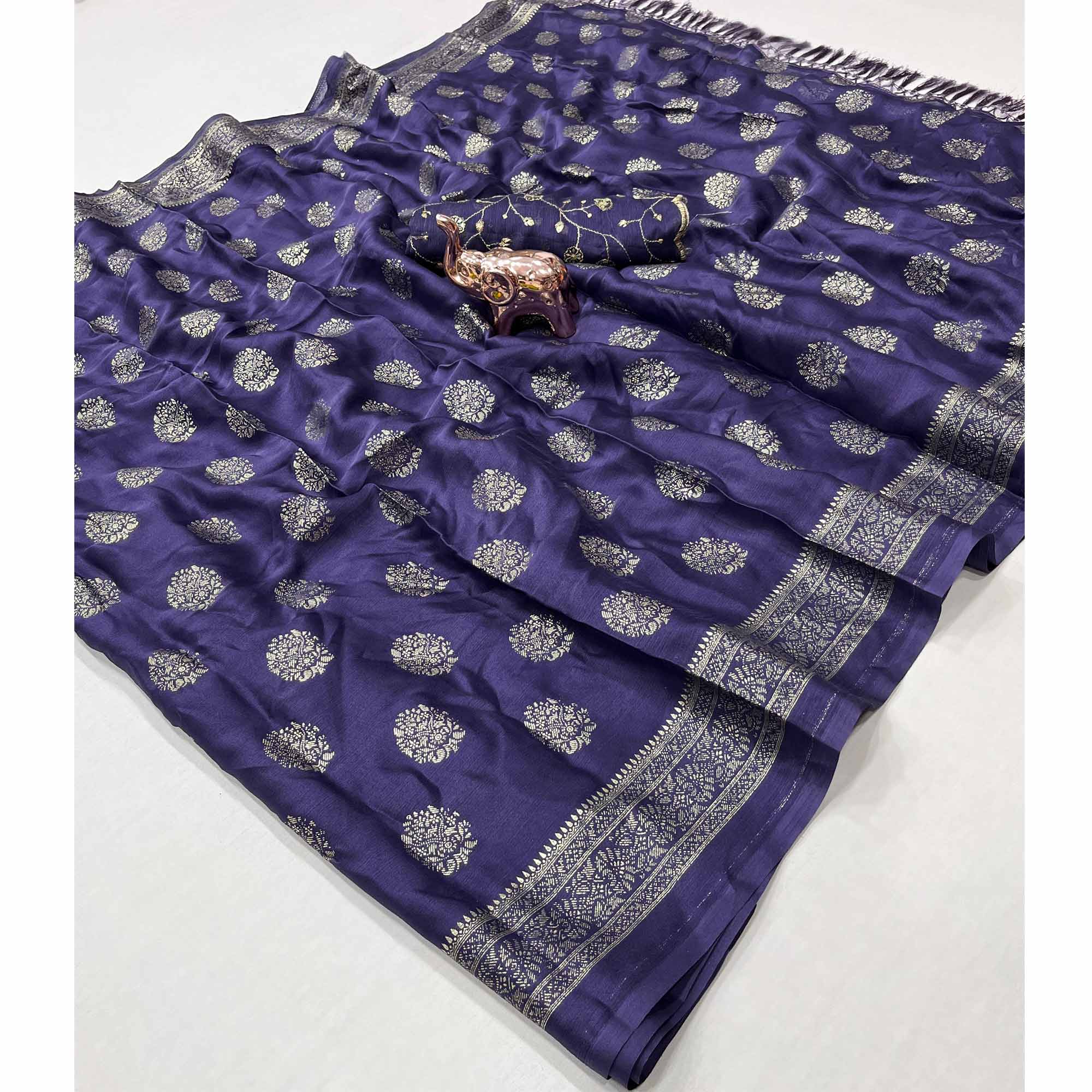 Elegant Purple Foil Floral Printed Georgette Saree With Tassel Detailing Pallu