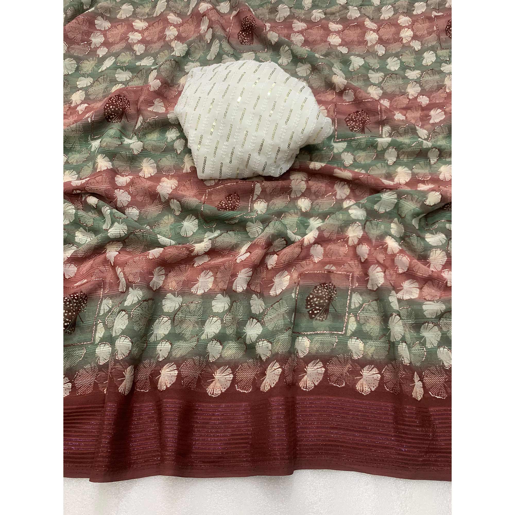 Maroon Floral Foil Printed Georgette Saree With Tassels