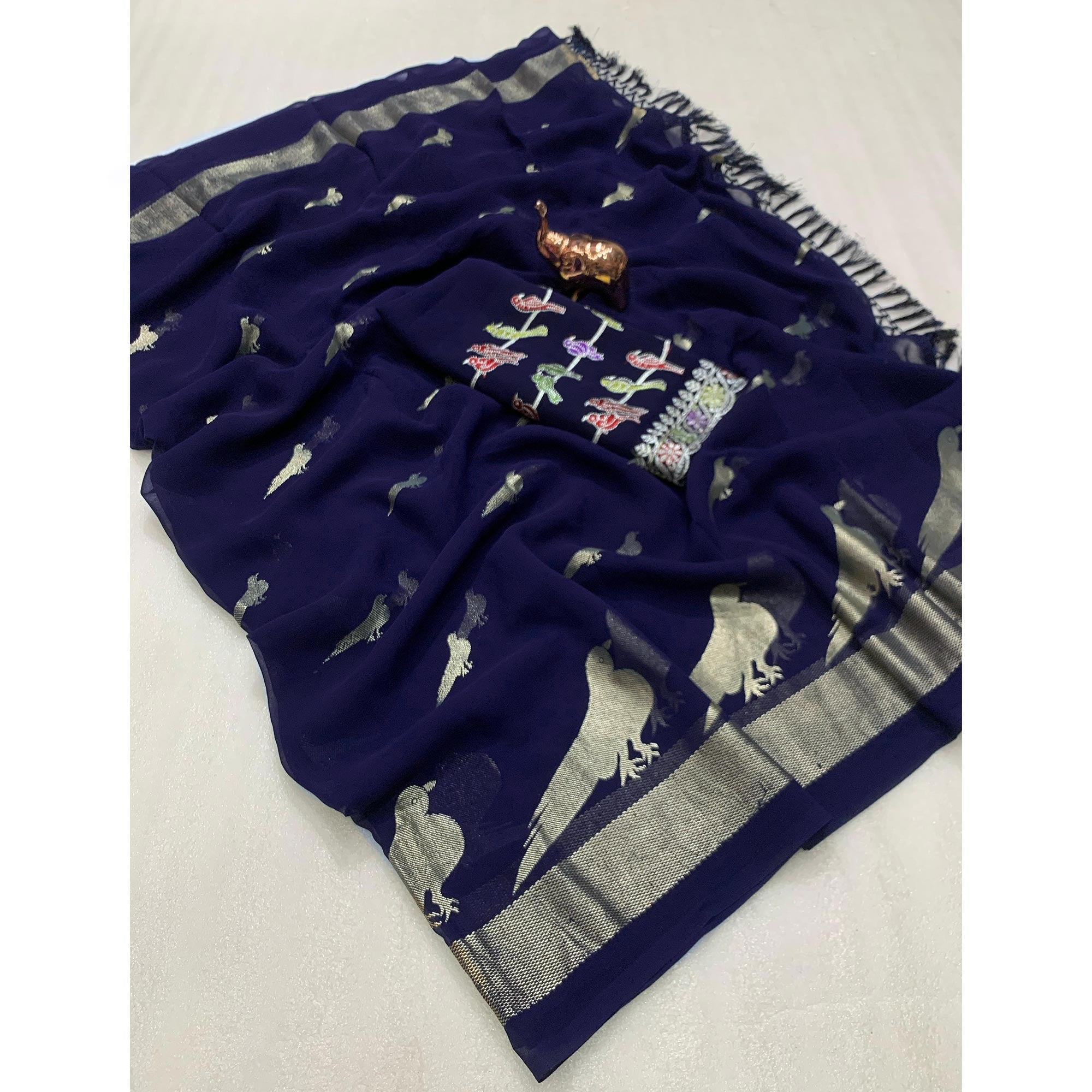 Blue Georgette Saree Adorned With Elegant Bird Embroidery
