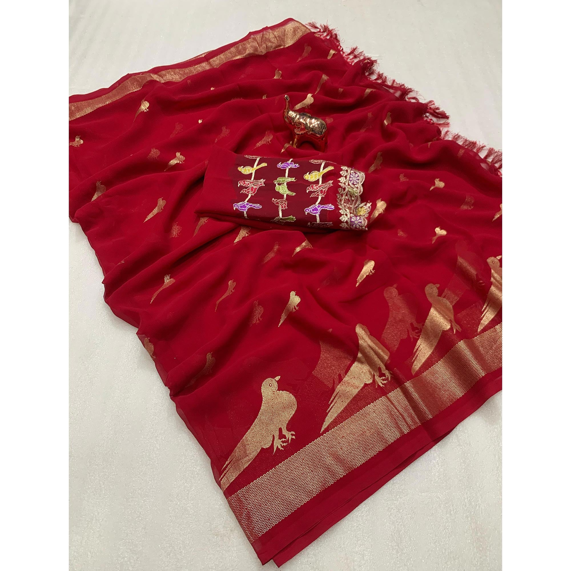 Pink Georgette Saree Adorned With Elegant Bird Embroidery