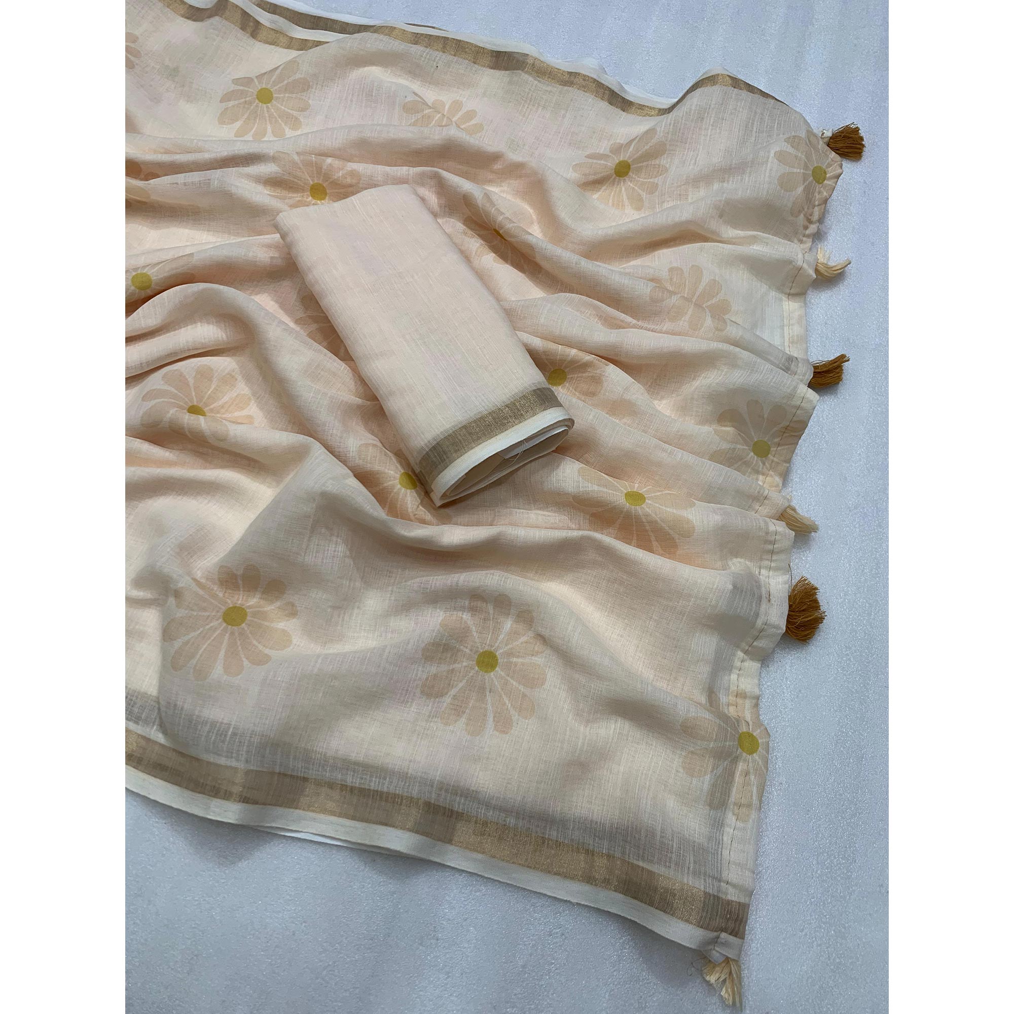 Cream Floral Printed Linen Silk Saree With Tassels