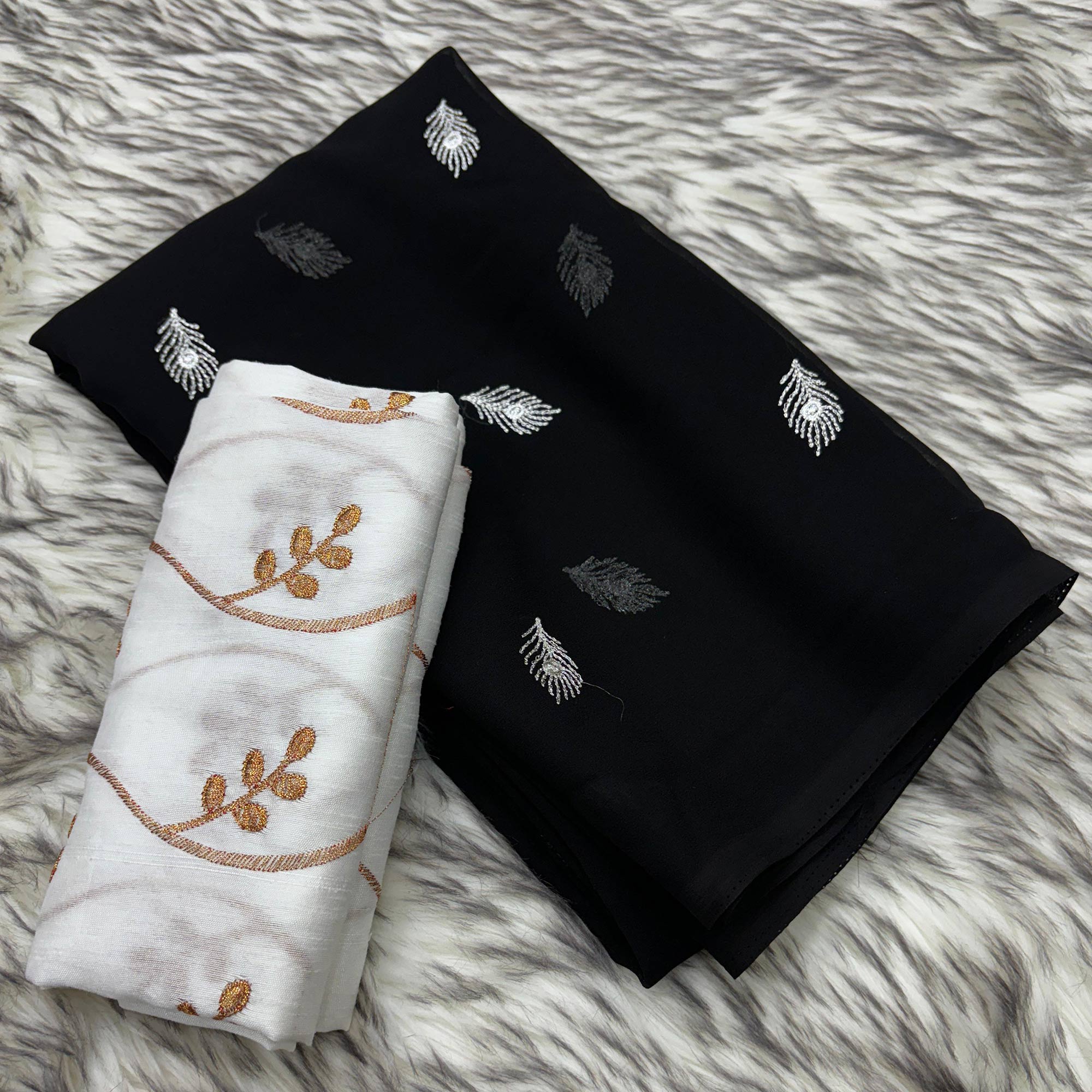 Black Embroidered Georgette Saree With Tassels