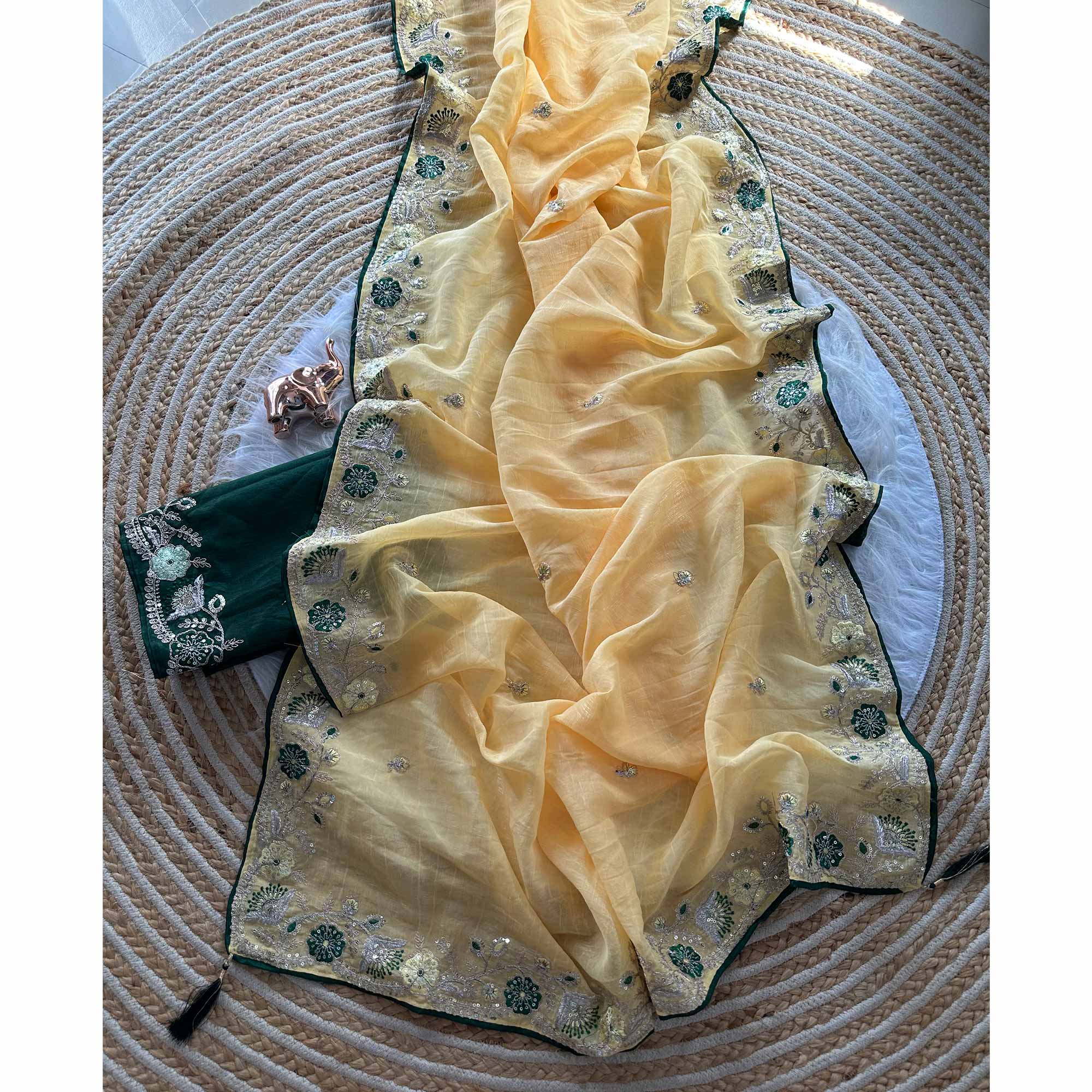 Yellow Pure Silk Saree Showcasing Floral Sequins Embroidery With A Decorative Tassel Pallu
