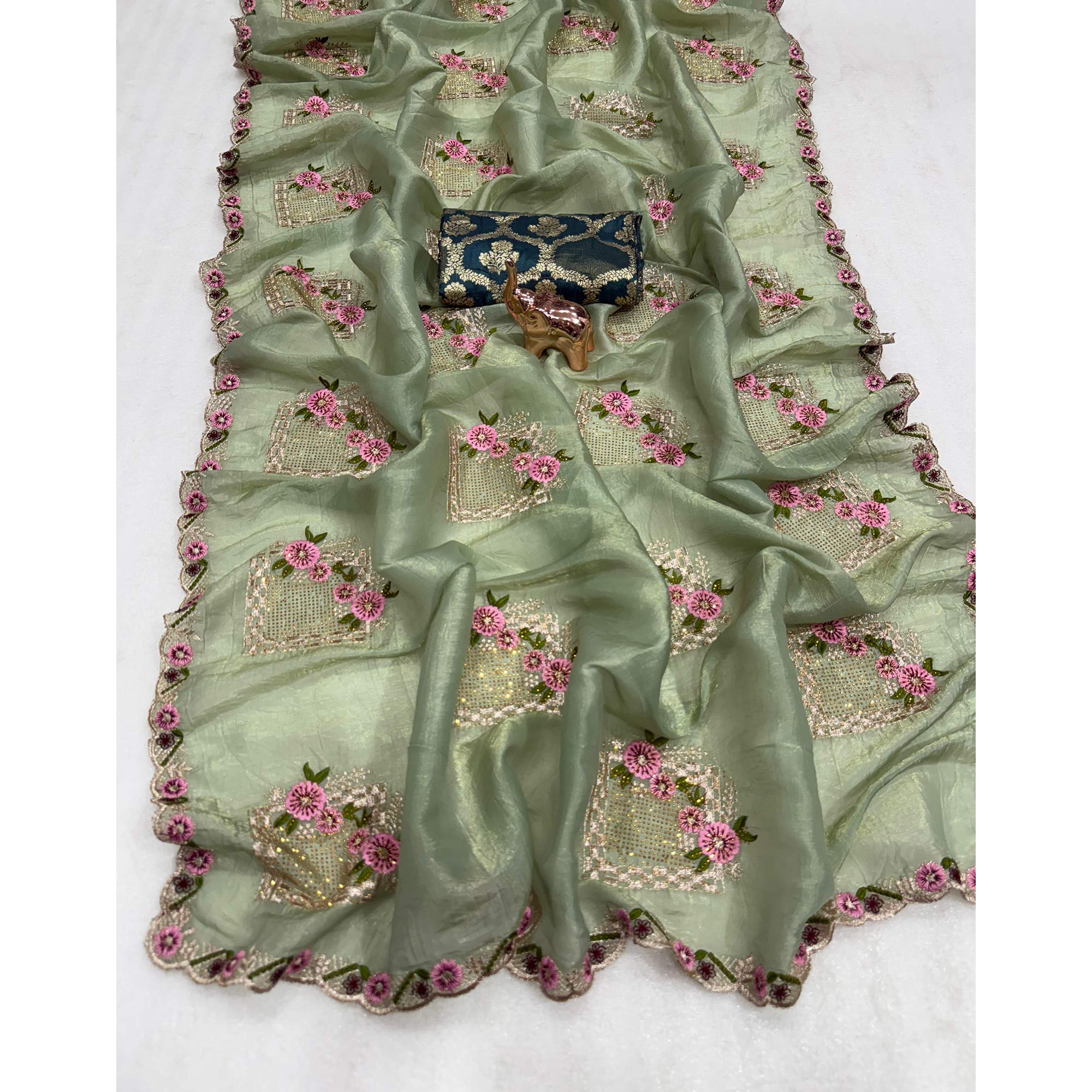 Stunning Sage Green Floral Embroidery & Swarovski Adorned Paper Silk Saree with Cutwork Border