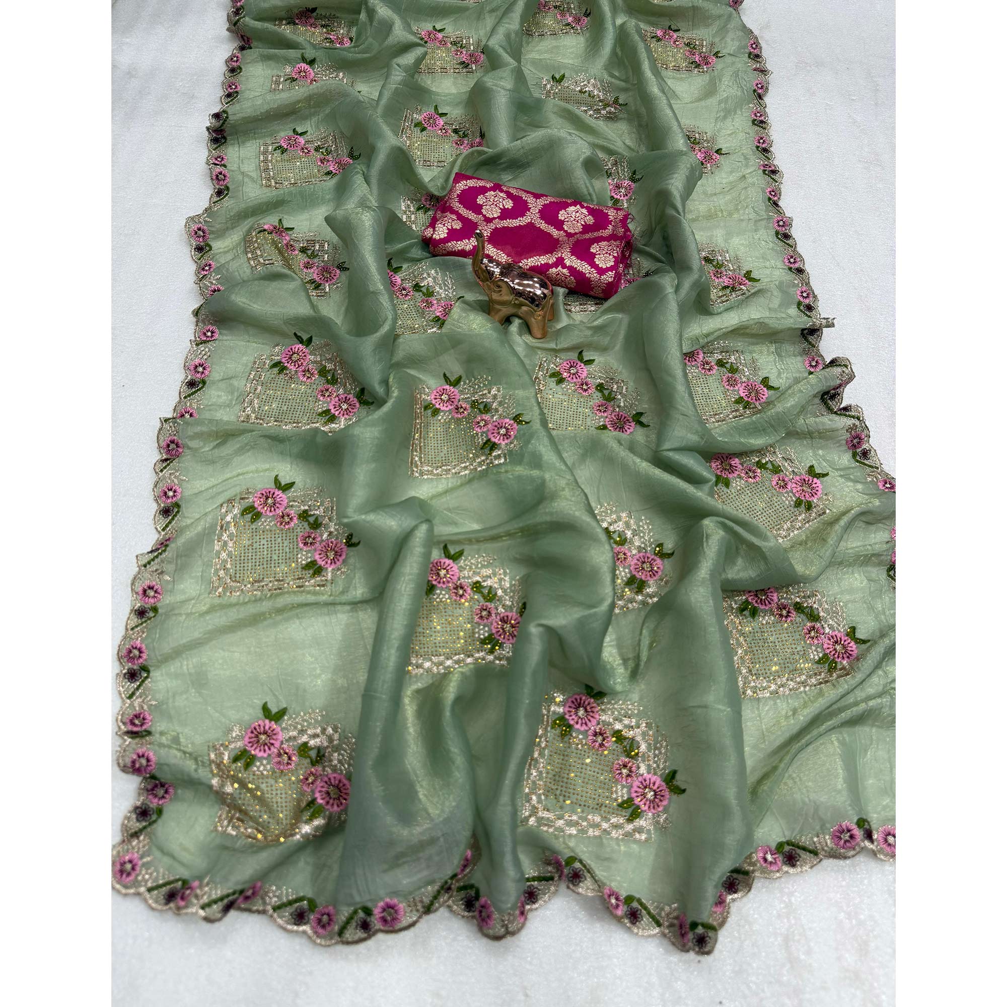 Stunning Sage Green Floral Embroidery & Swarovski Adorned Paper Silk Saree with Cutwork Border