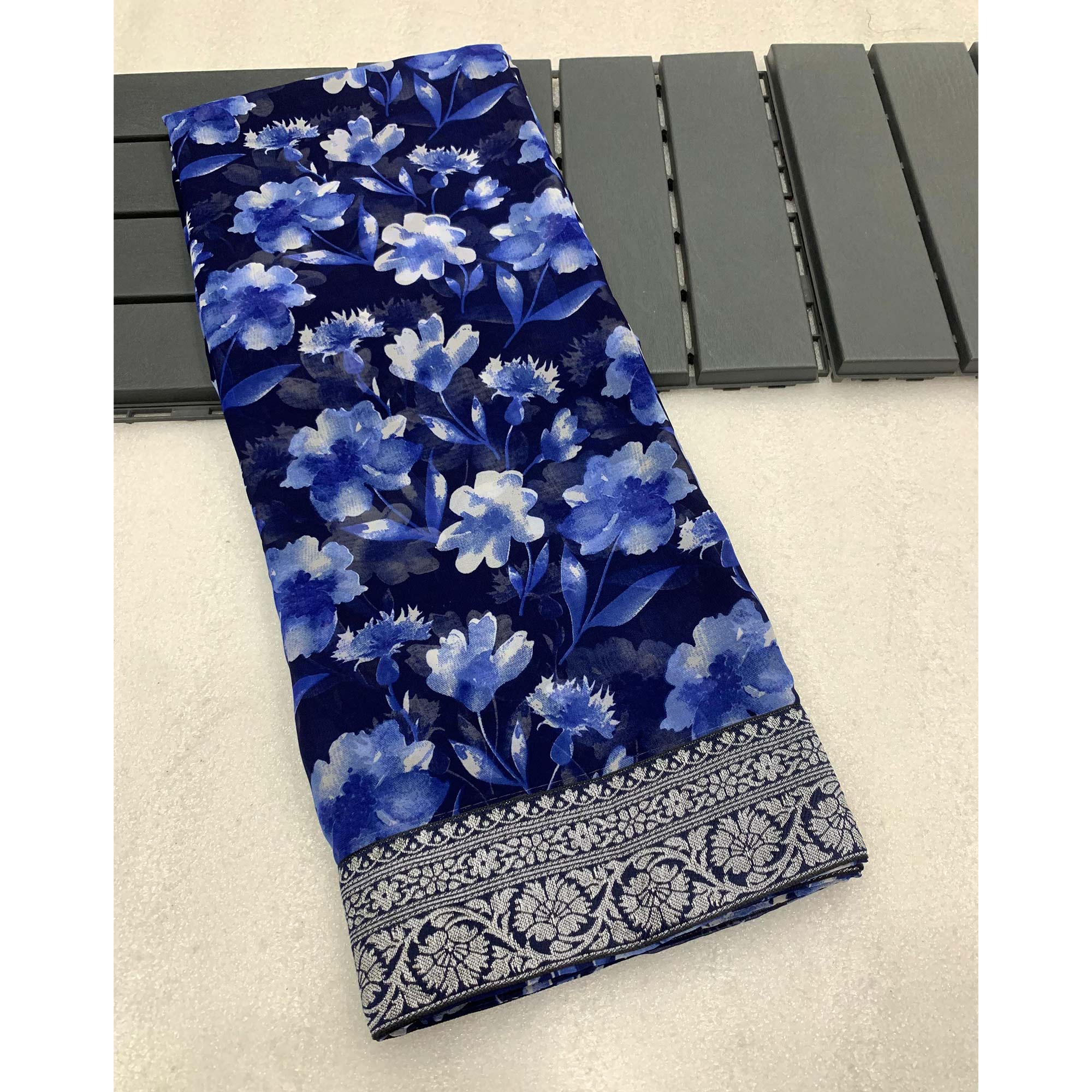 Blue Floral Printed Georgette Saree With Woven Border