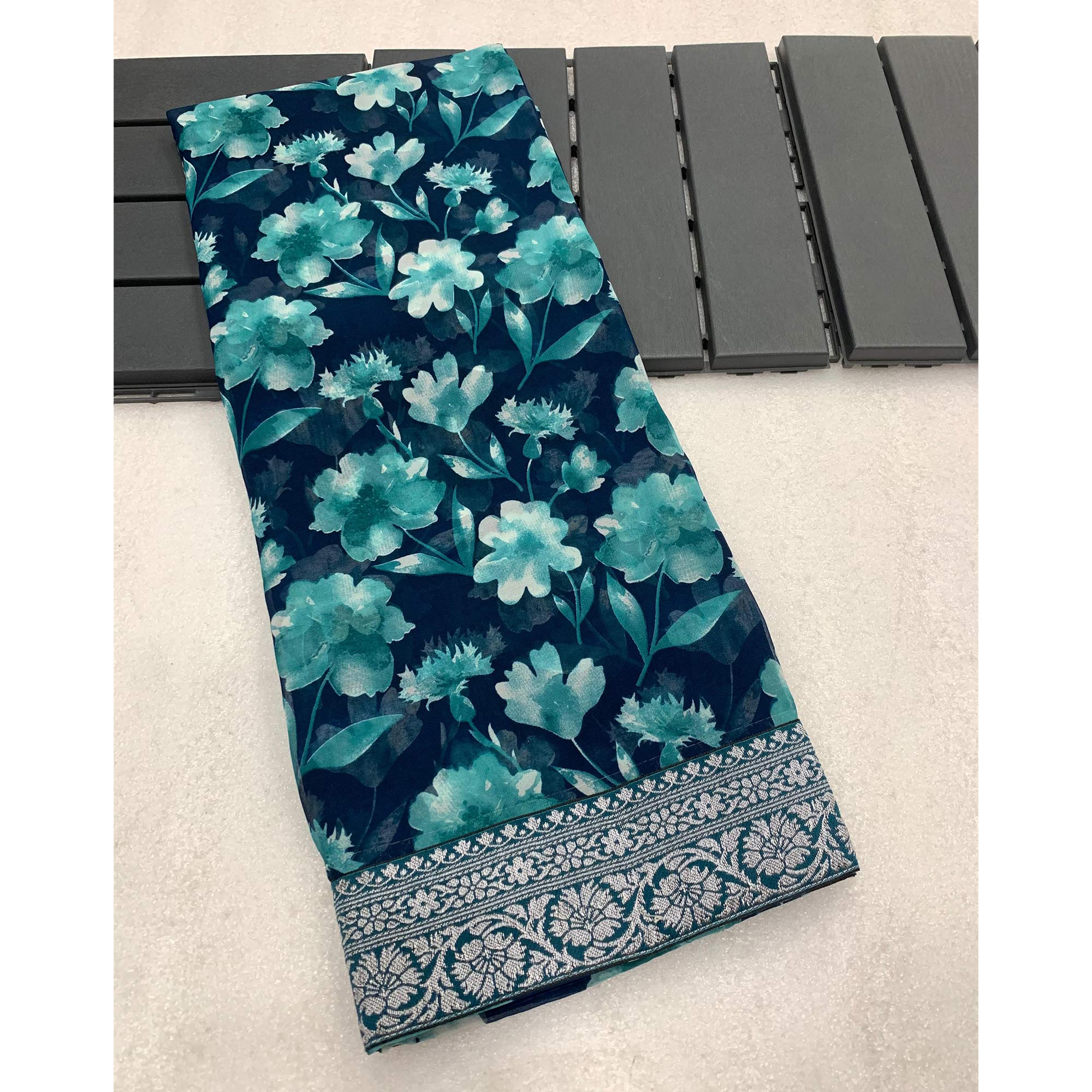 Teal Floral Printed Georgette Saree With Woven Border