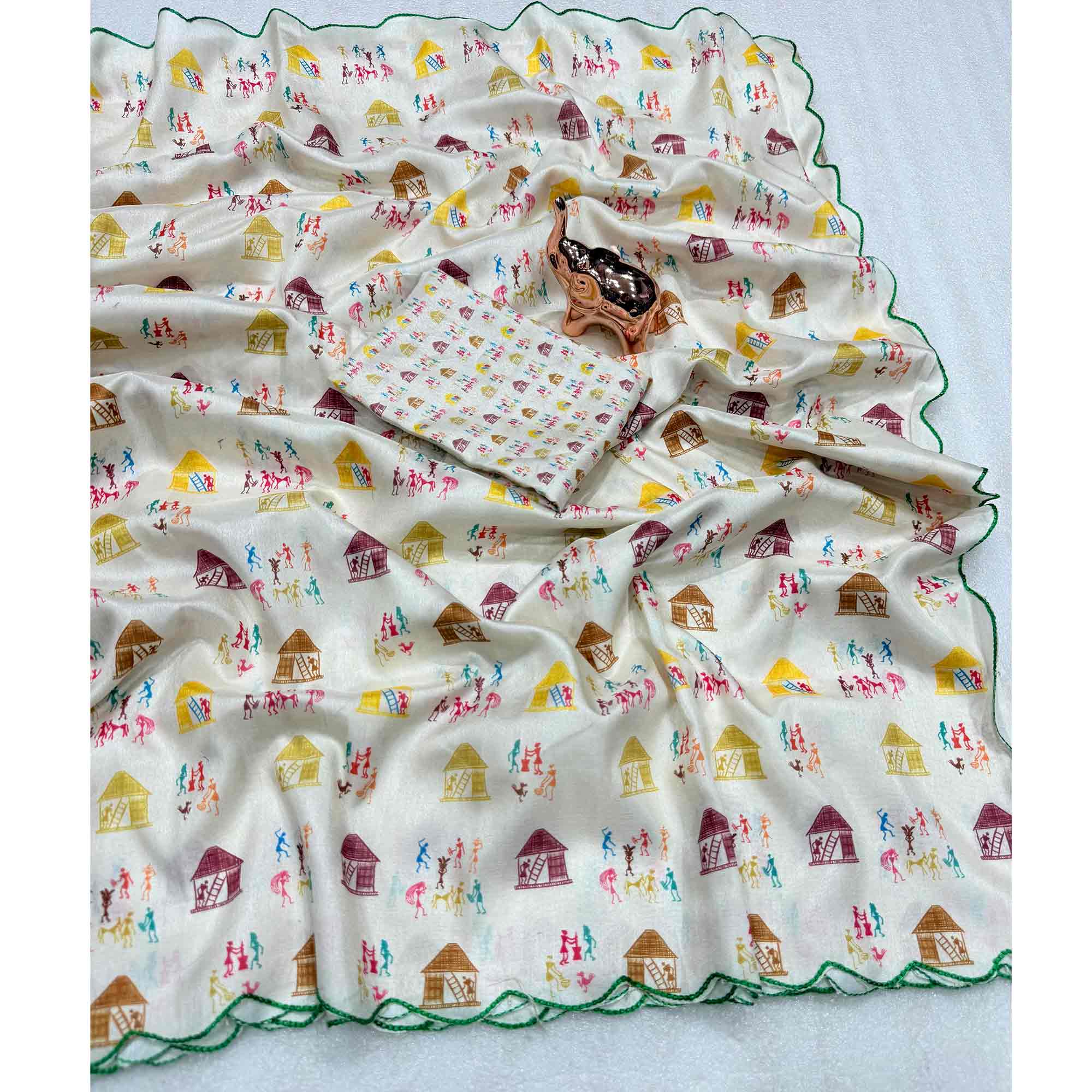 Festive Off White Soft Dola Silk Saree with Timeless Warli Print Work