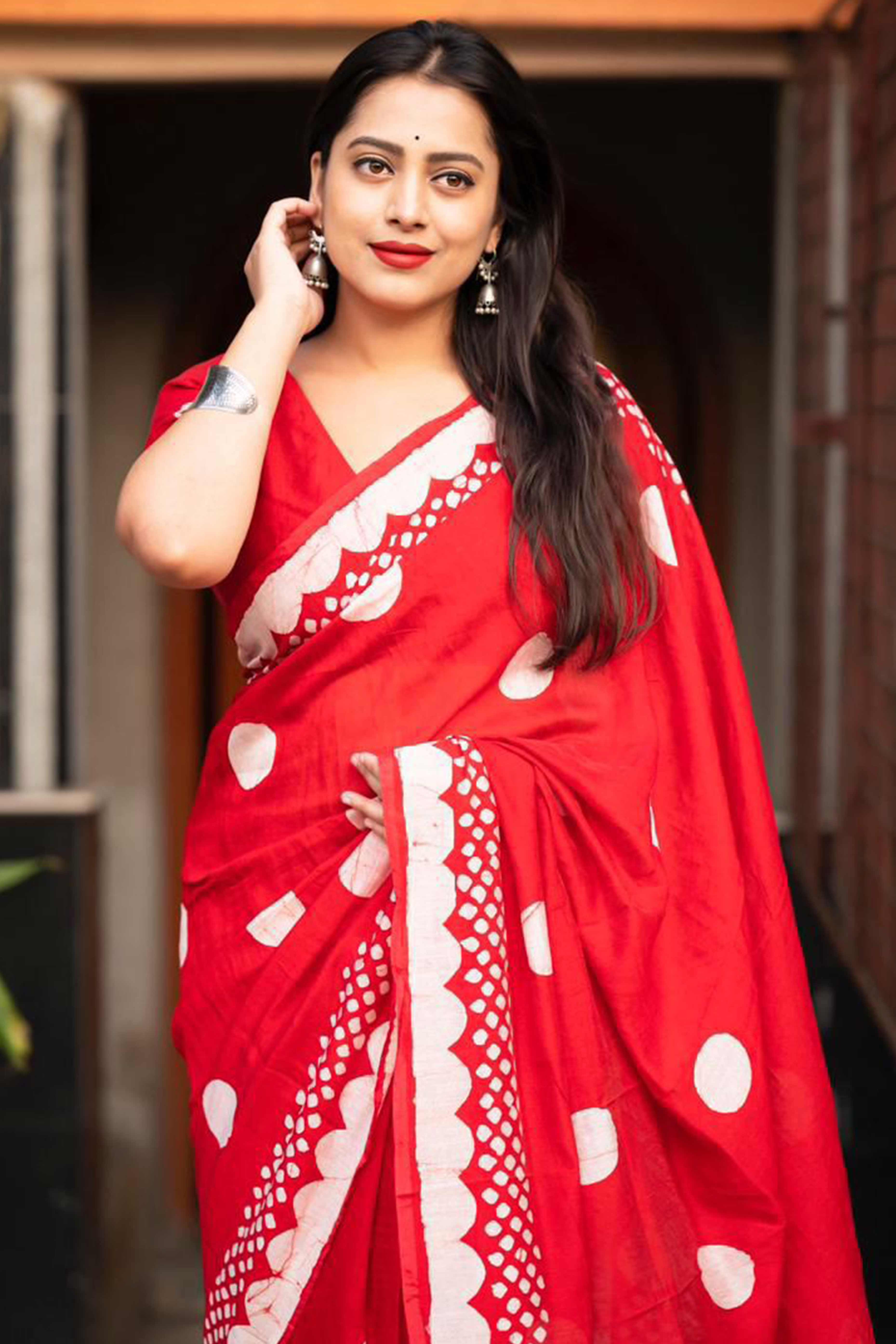 Red Linen Saree With Vibrant Polka Digital Print & Trendy Tassel Pallu