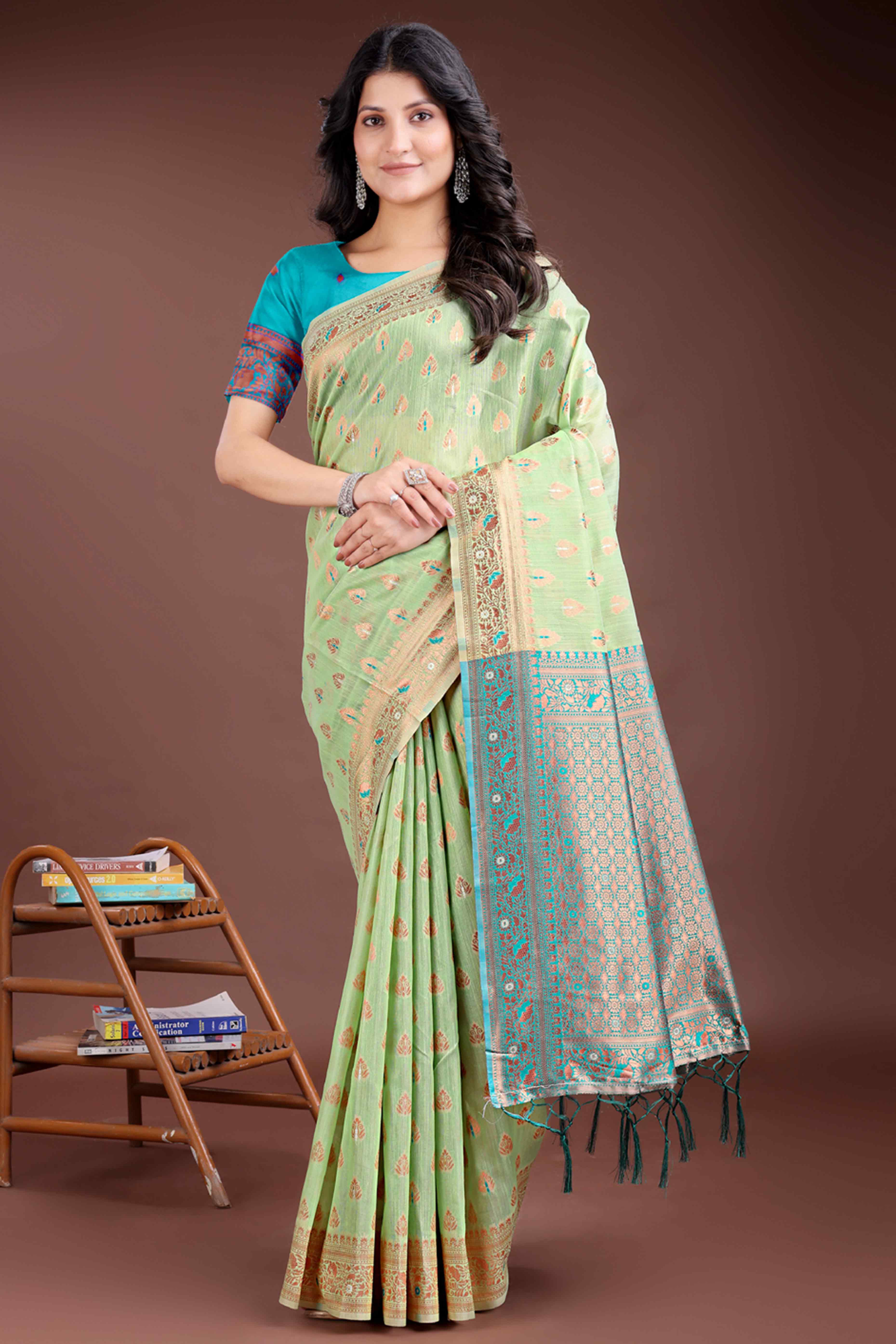 Harmonious Light Green Floral Zari Weaving Cotton Blend Saree with Graceful Tassels