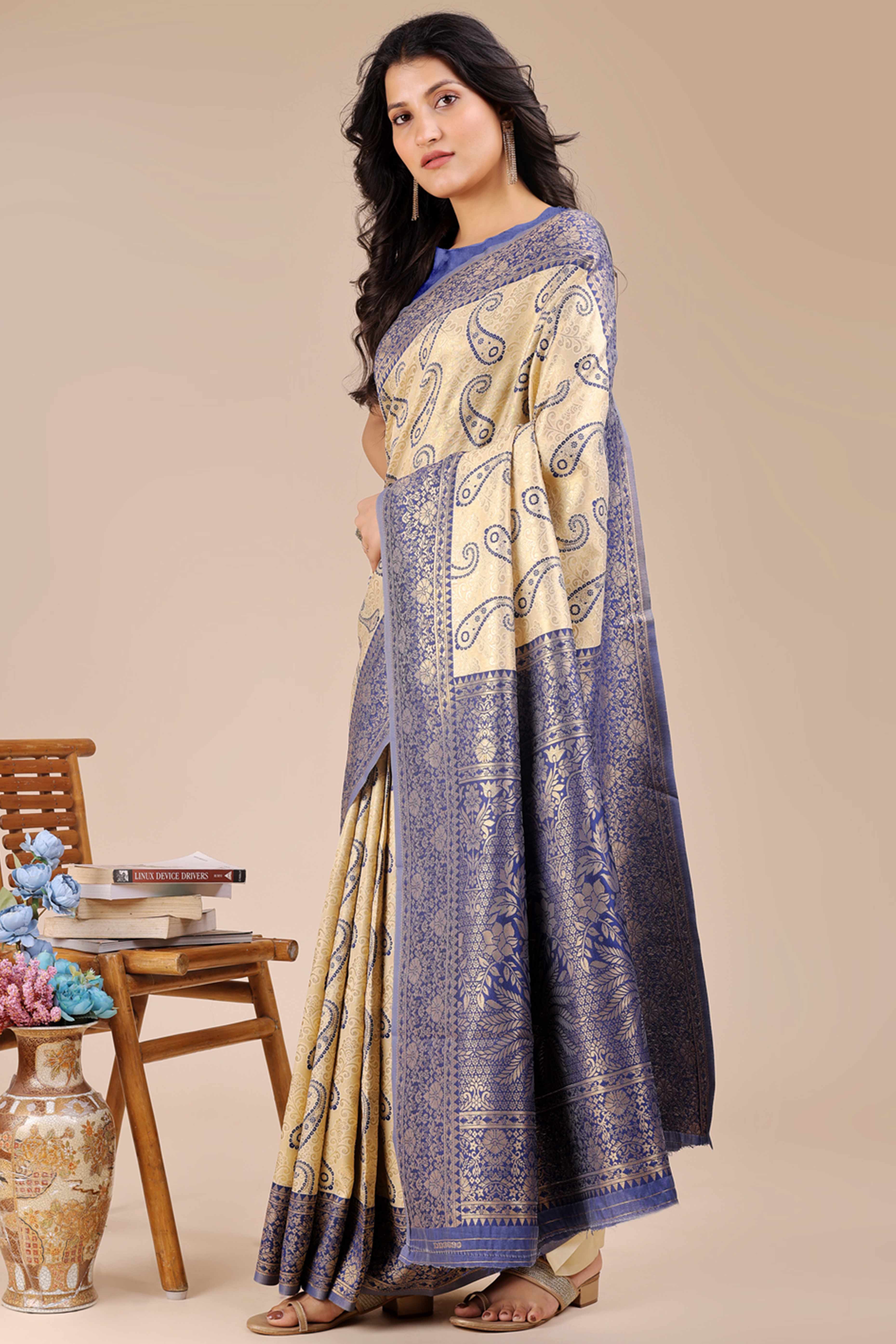 Cream Banarasi Silk Saree Featuring Navy Blue Floral Zari Weaving and a Rich Contrast Border