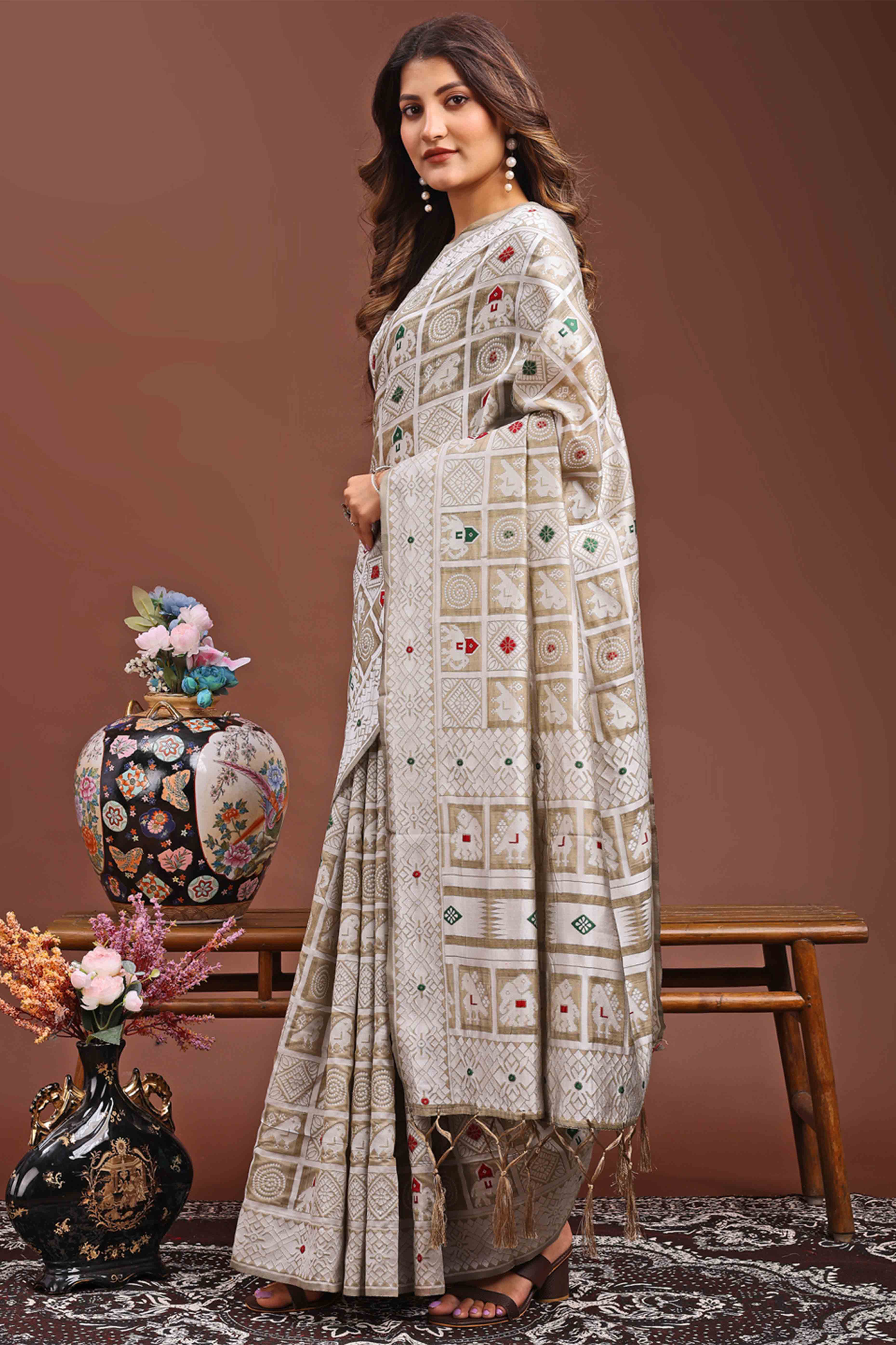 Brown Linen Cotton Saree Adorned With Zari Weaving & Tassel pallu