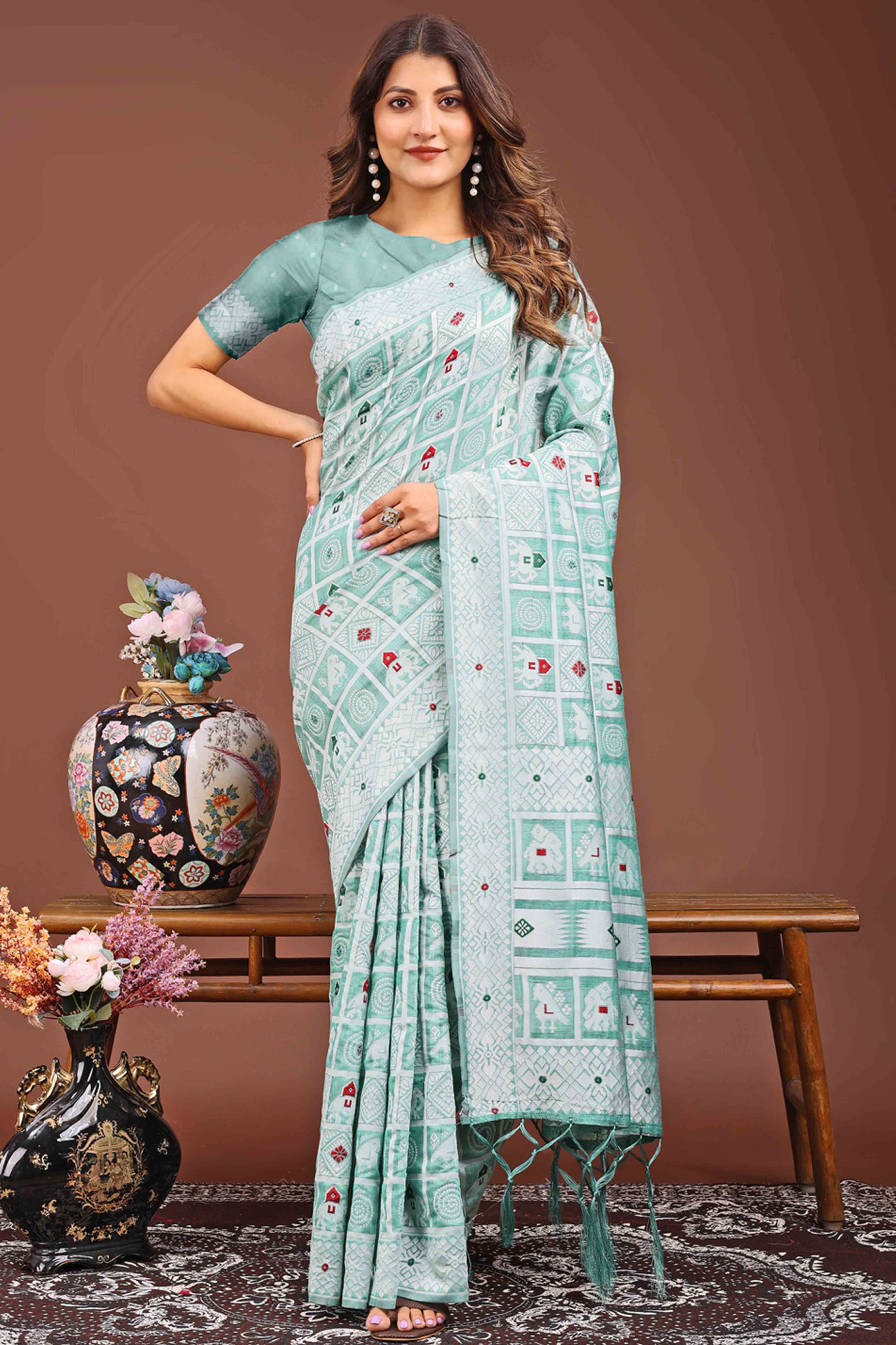 Green Linen Cotton Saree Adorned With Zari Weaving & Tassel pallu