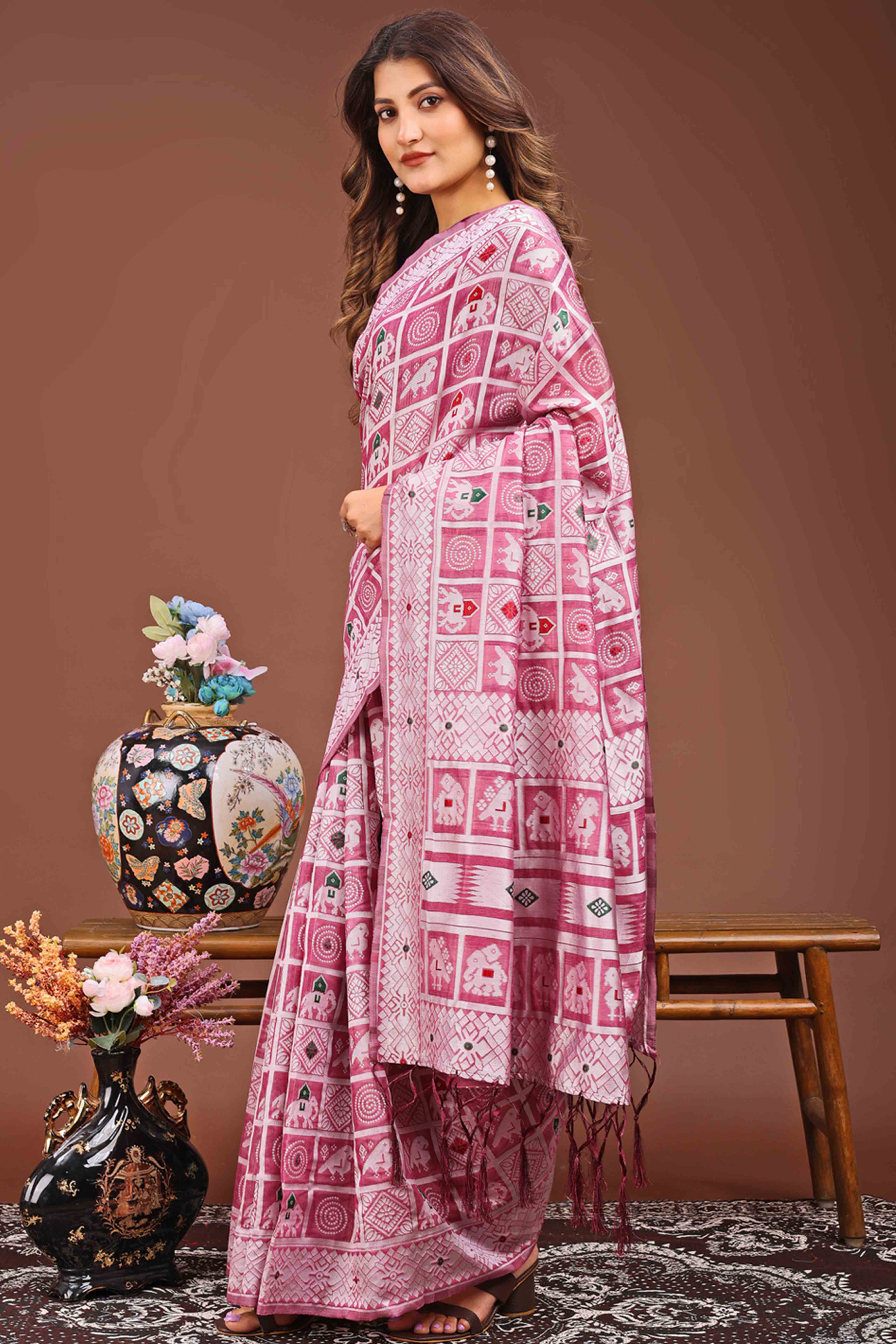 Pink Linen Cotton Saree Adorned With Zari Weaving & Tassel pallu