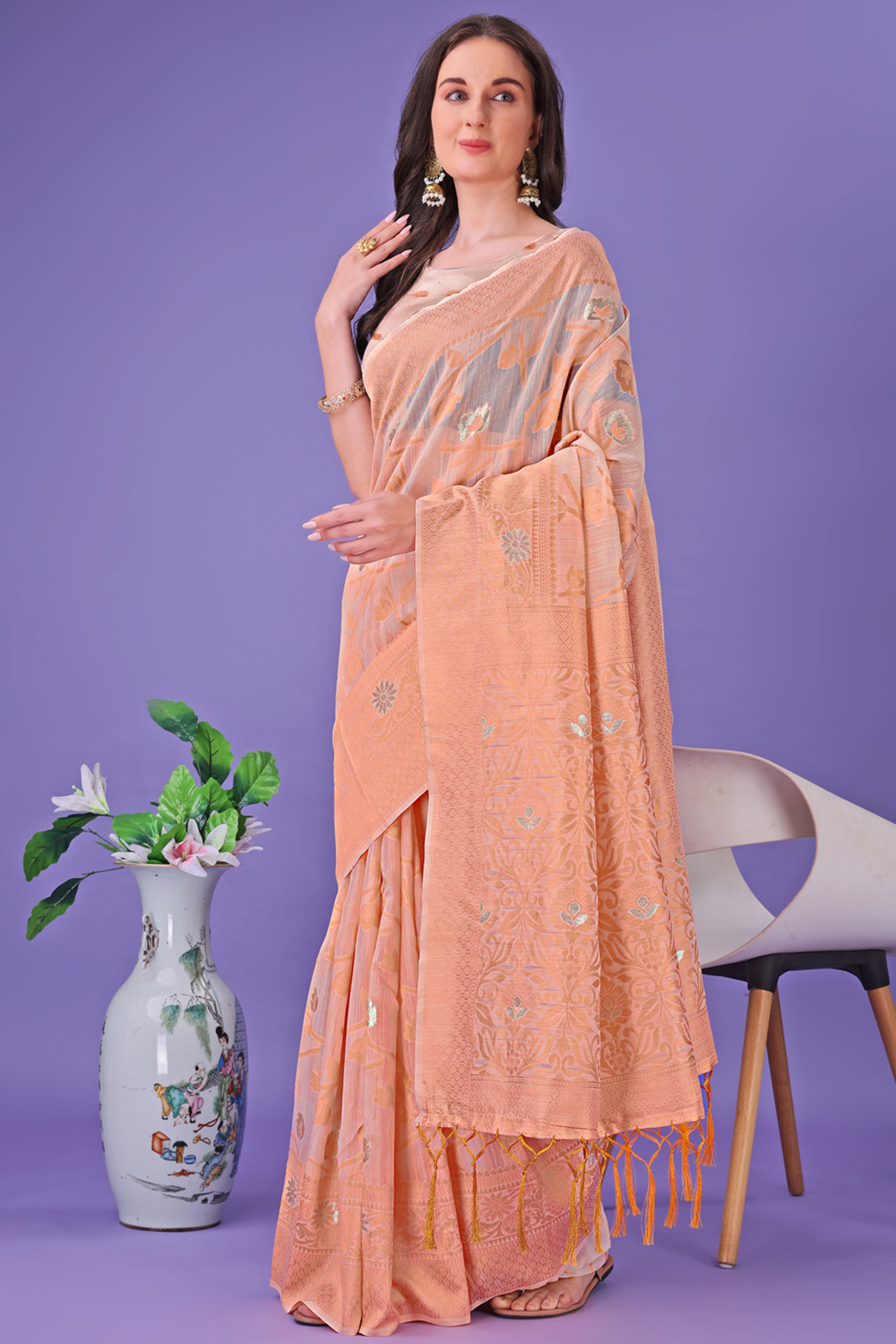 Peach Floral Pattern Woven Saree in a Soft Cotton Blend with Tasseled Edges