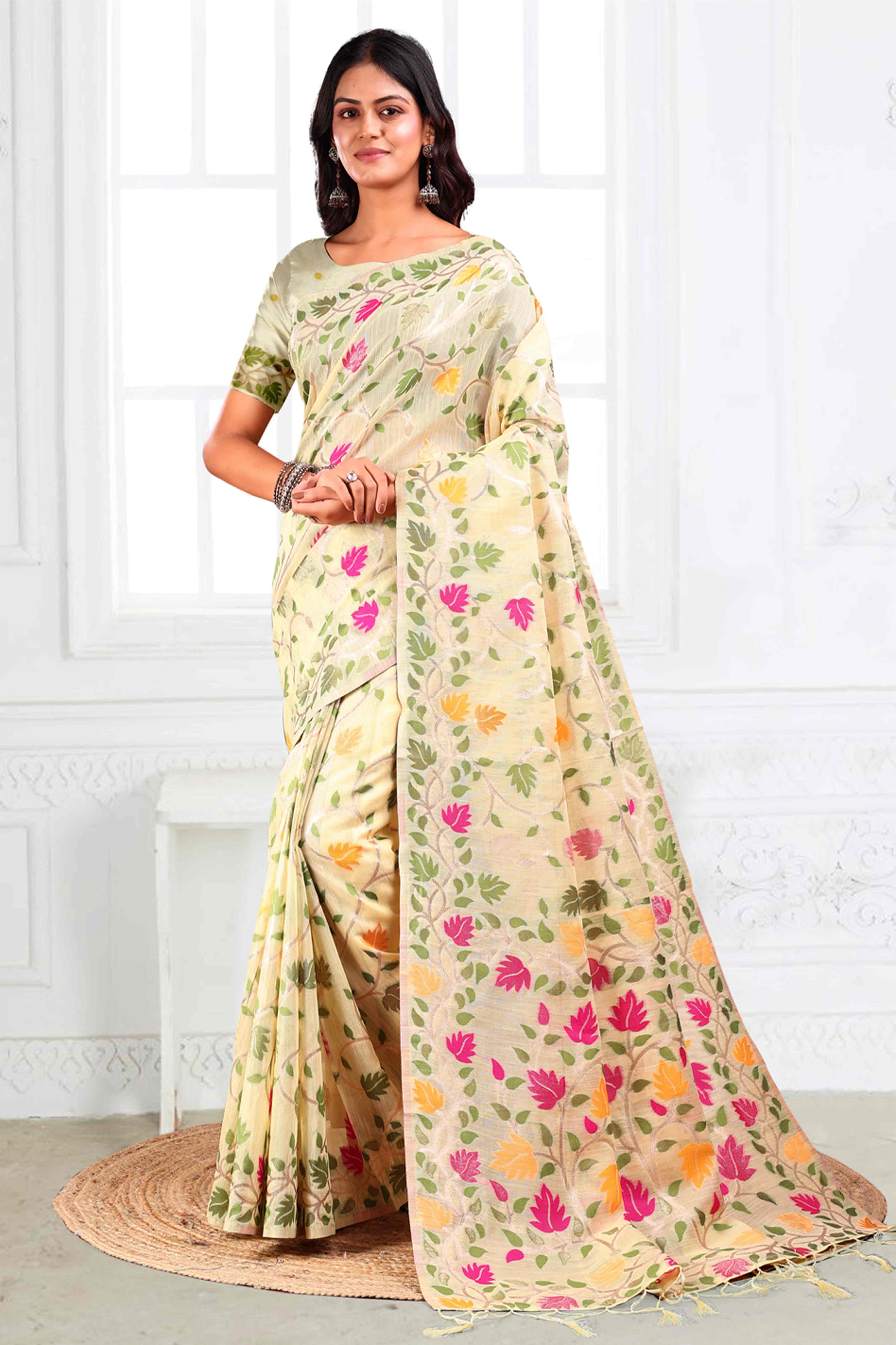 Cream Linen Cotton Silk  Saree Enhanced With Floral Zari Weaving & Tasselled Pallu Finish