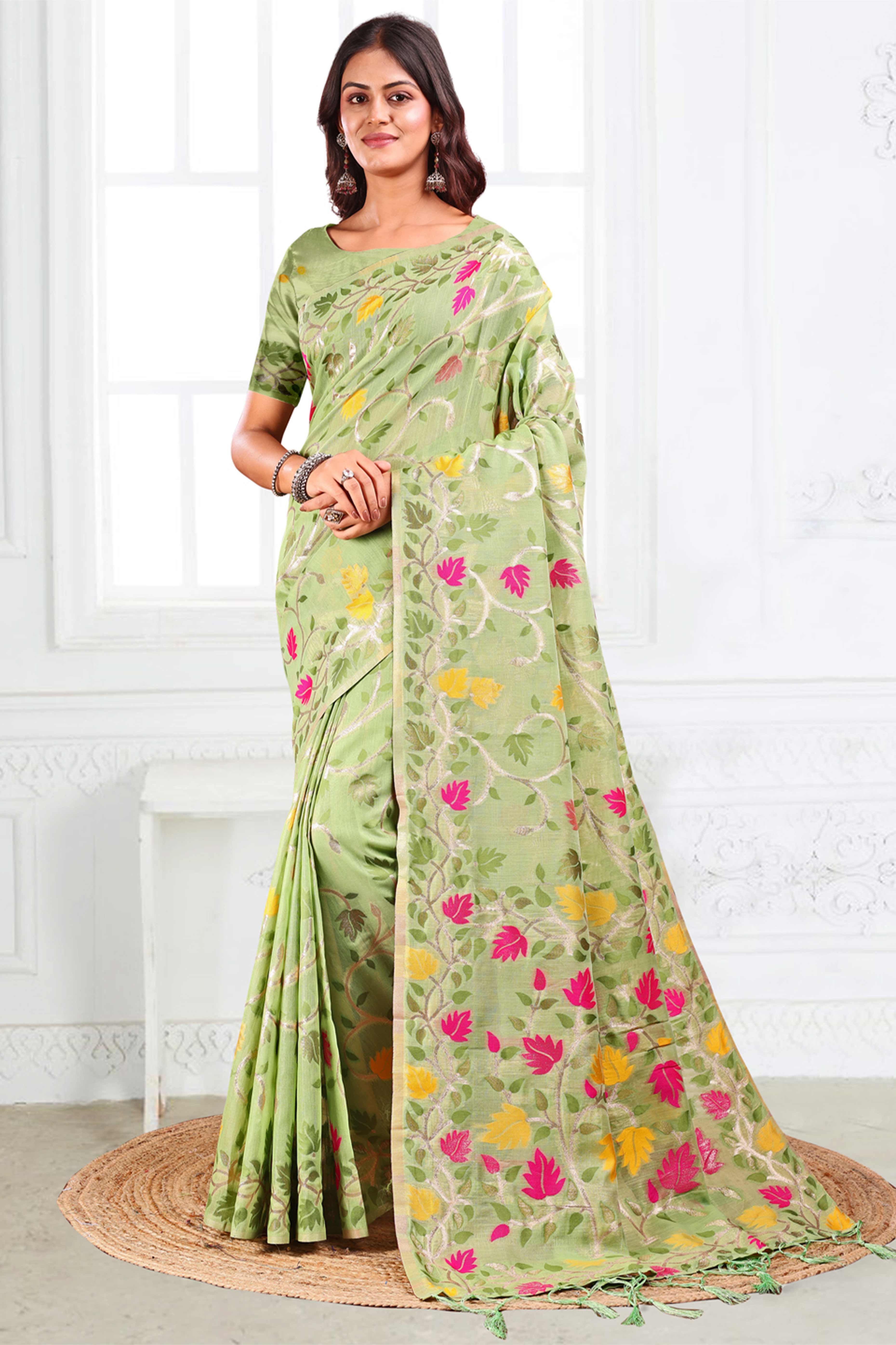 Light Green Linen Cotton Silk  Saree Enhanced With Floral Zari Weaving & Tasselled Pallu Finish