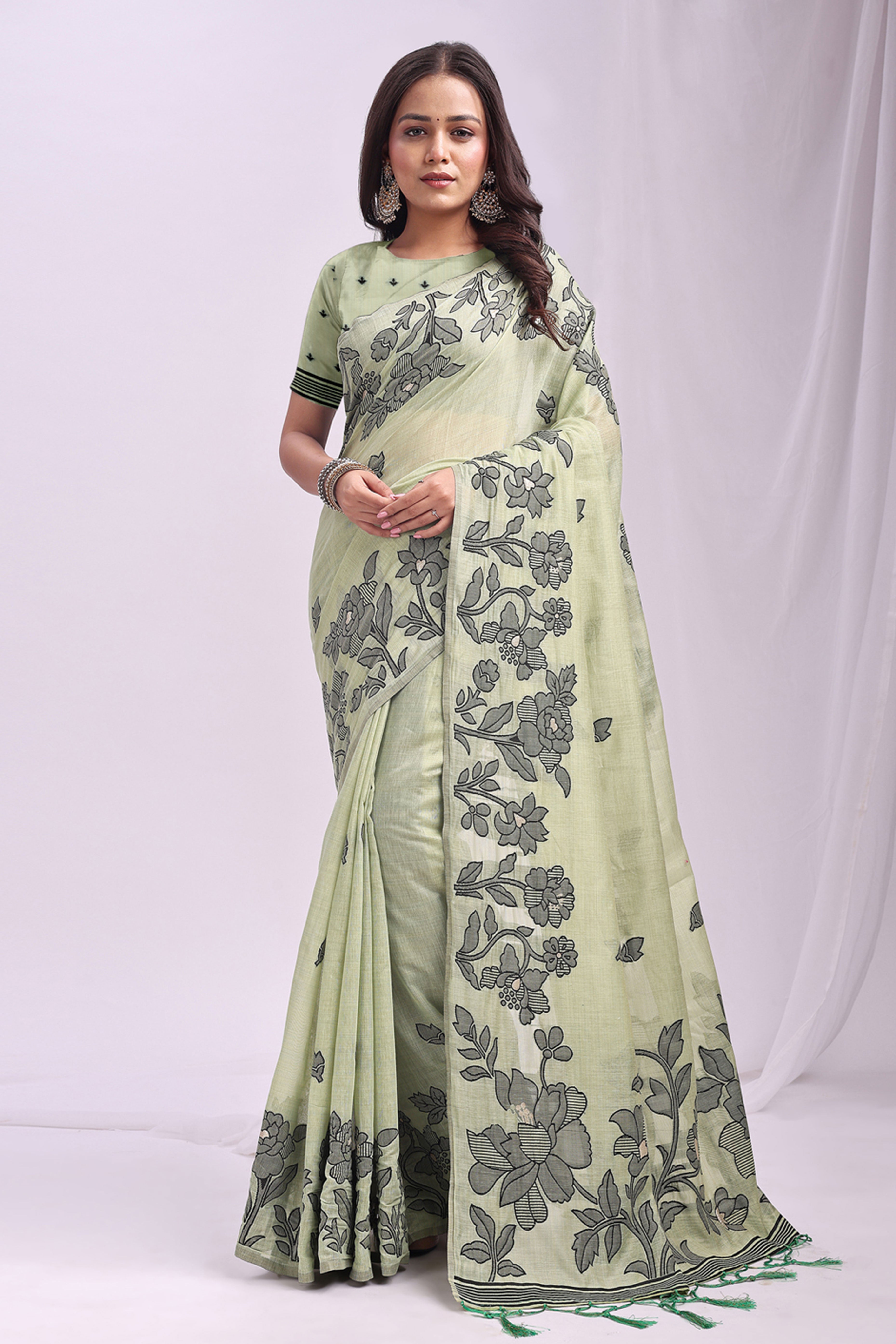 Light Green Ethnic Saree in a Linen Cotton Blend Adorned with Floral Weave Designs