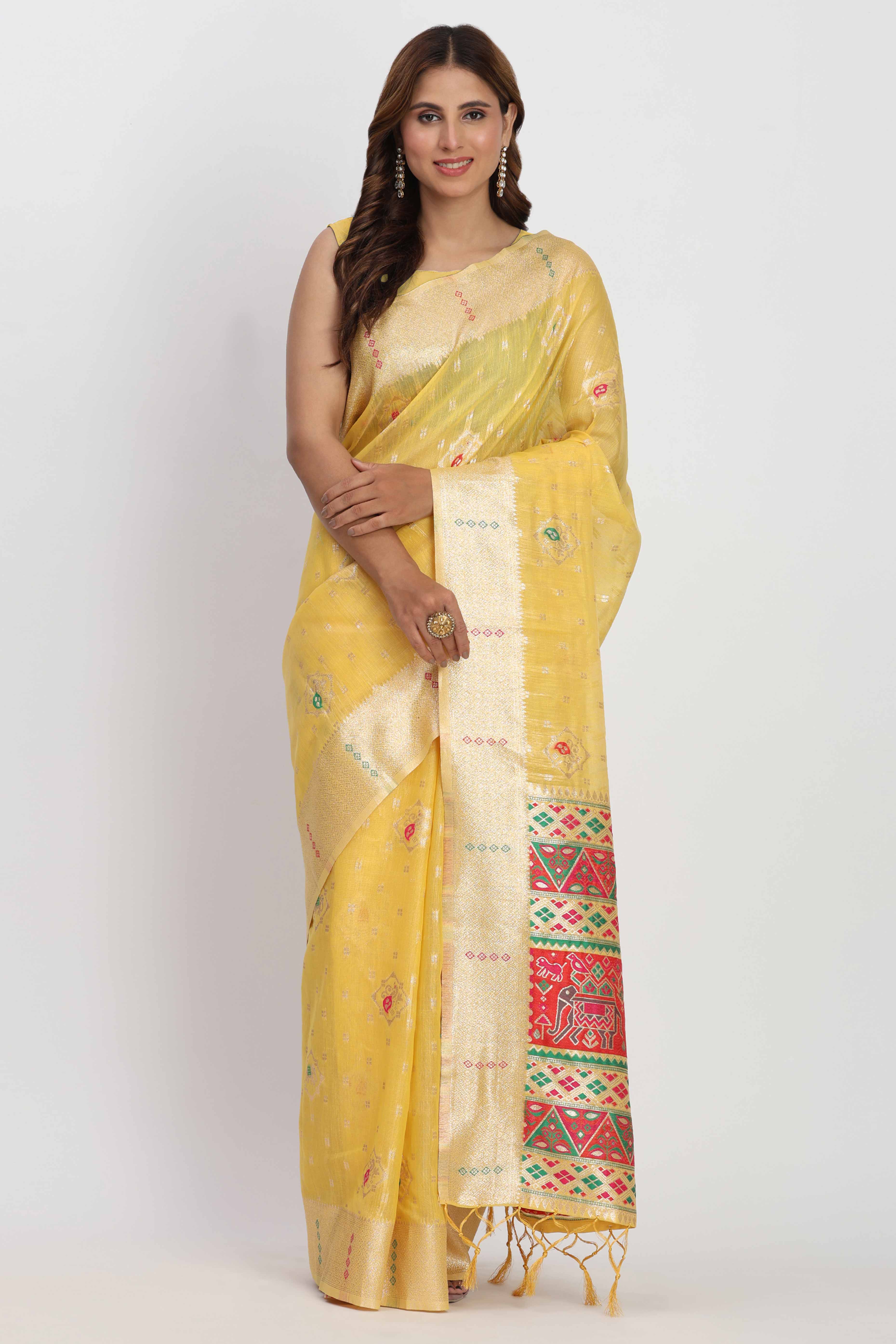 Shimmering Yellow linen Cotton Saree Embellished With Rich Zari Weaving And Tassels Pallu
