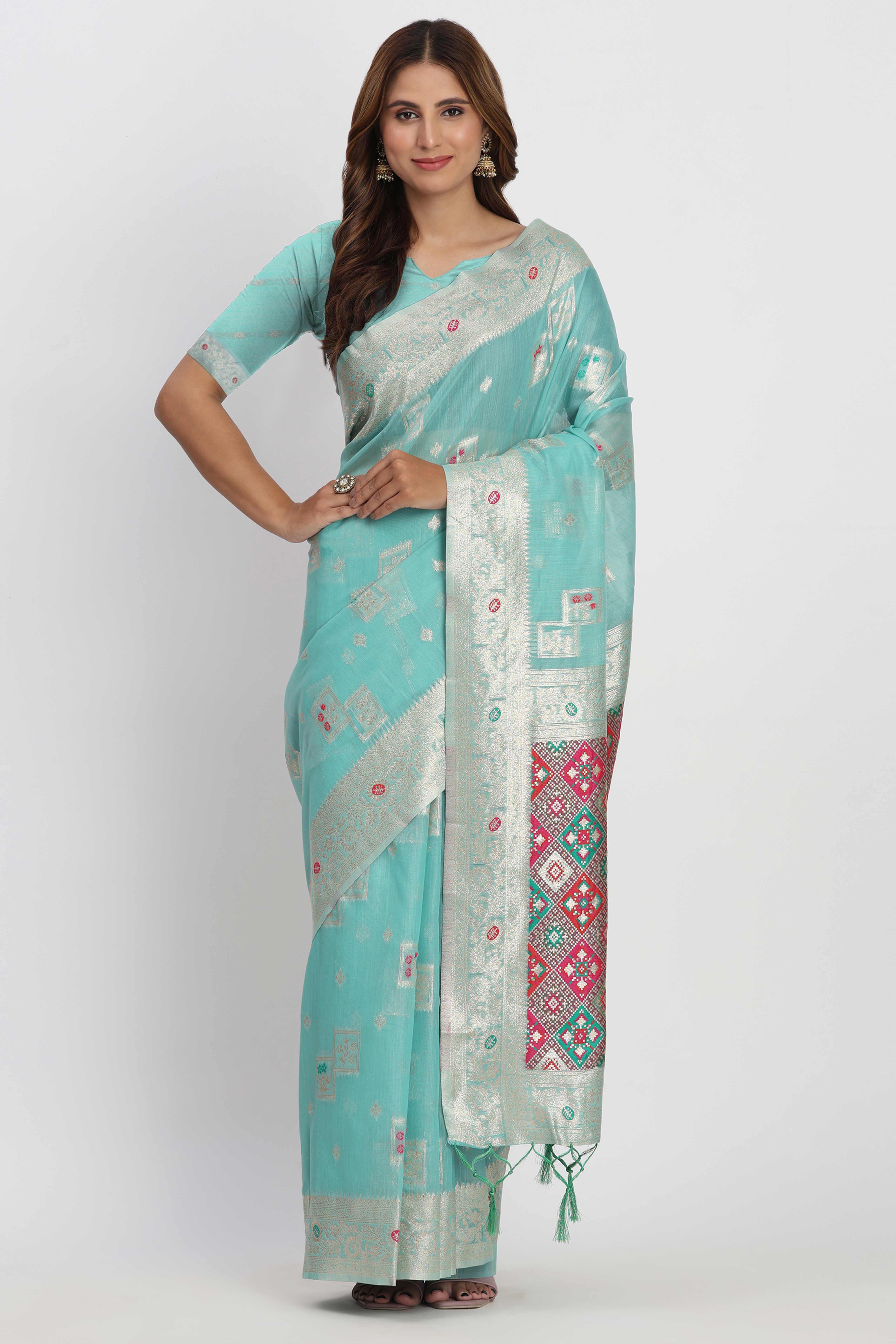 Floral Zari Weaving Brings Regal Beauty To This Turquoise Linen Cotton Saree With Tassel Accents