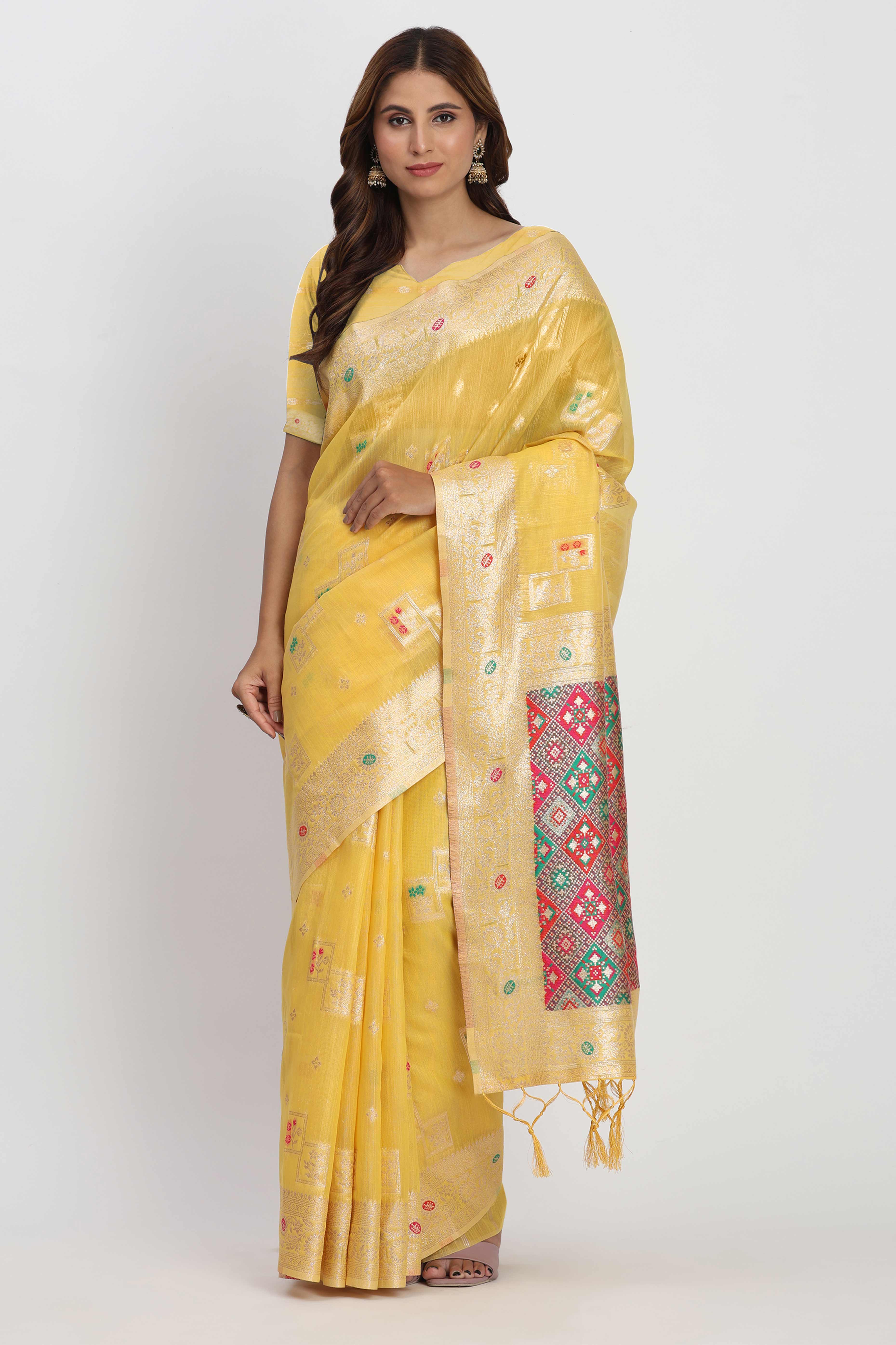 Floral Zari Weaving Brings Regal Beauty To This Yellow Linen Cotton Saree With Tassel Accents