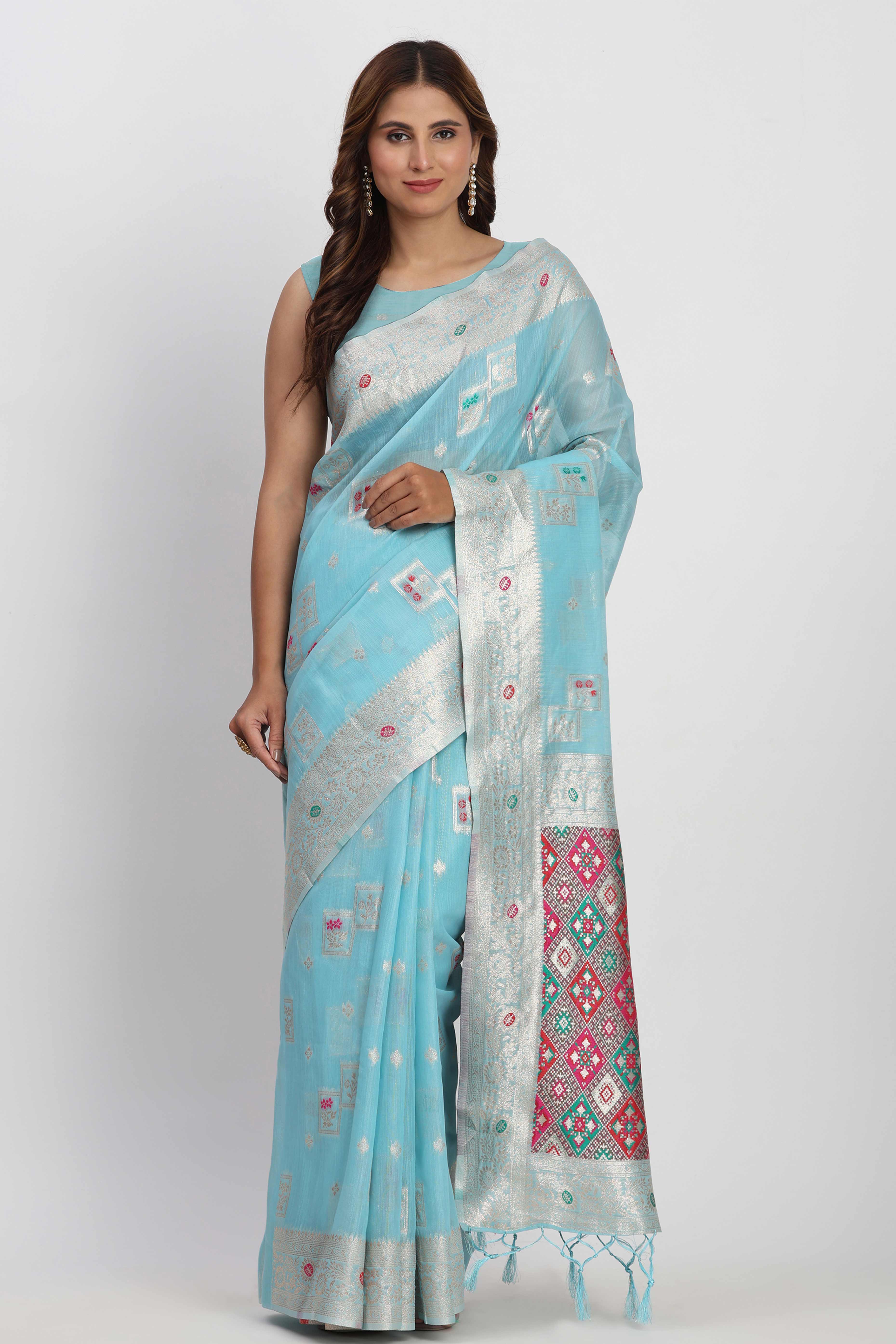 Floral Zari Weaving Brings Regal Beauty To This Sky Blue Linen Cotton Saree With Tassel Accents