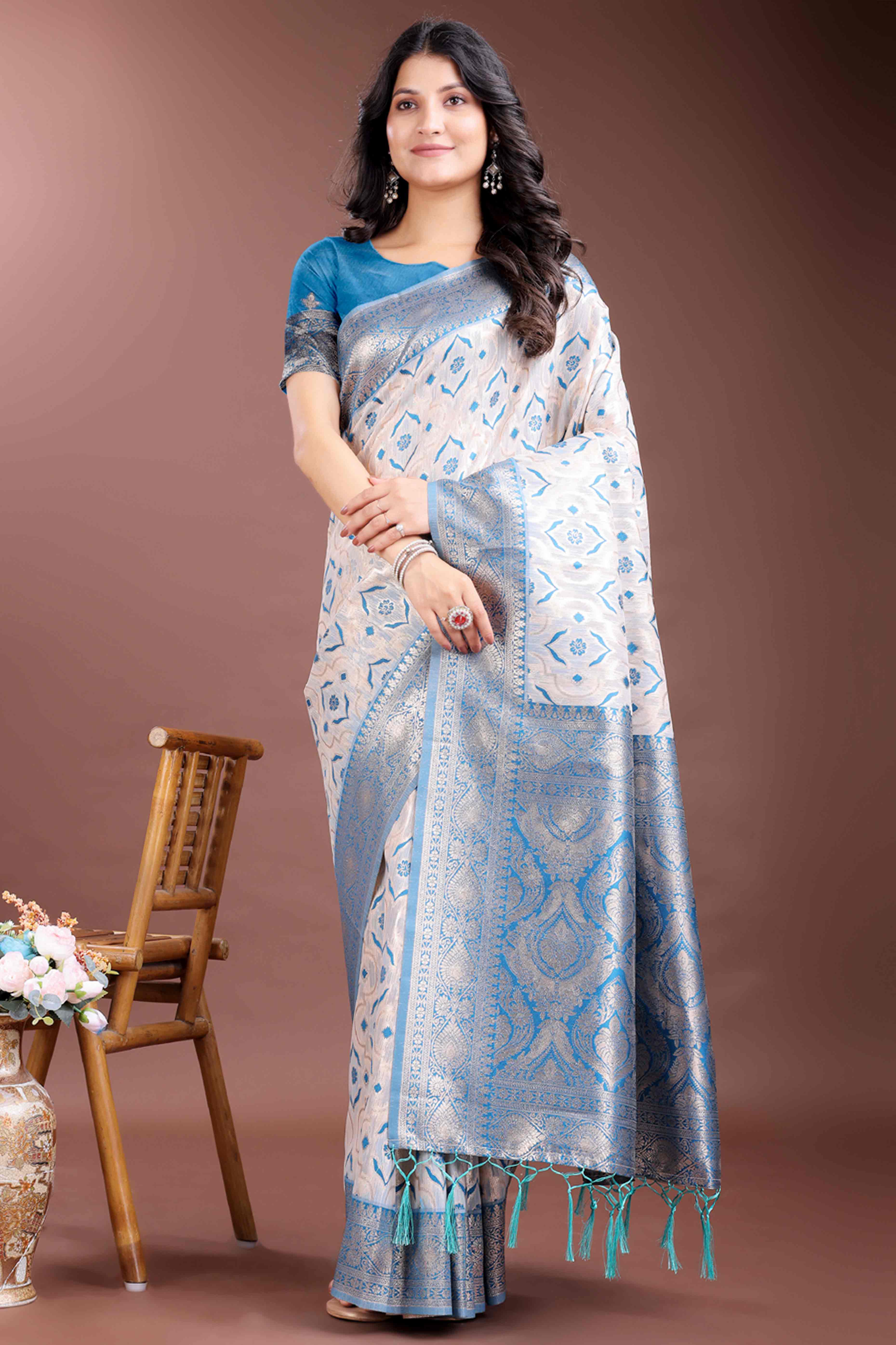 Tranquil Sky Blue Traditional Ikkat Style Zari Weaving Cotton Blend Saree with Charming Tassel Details
