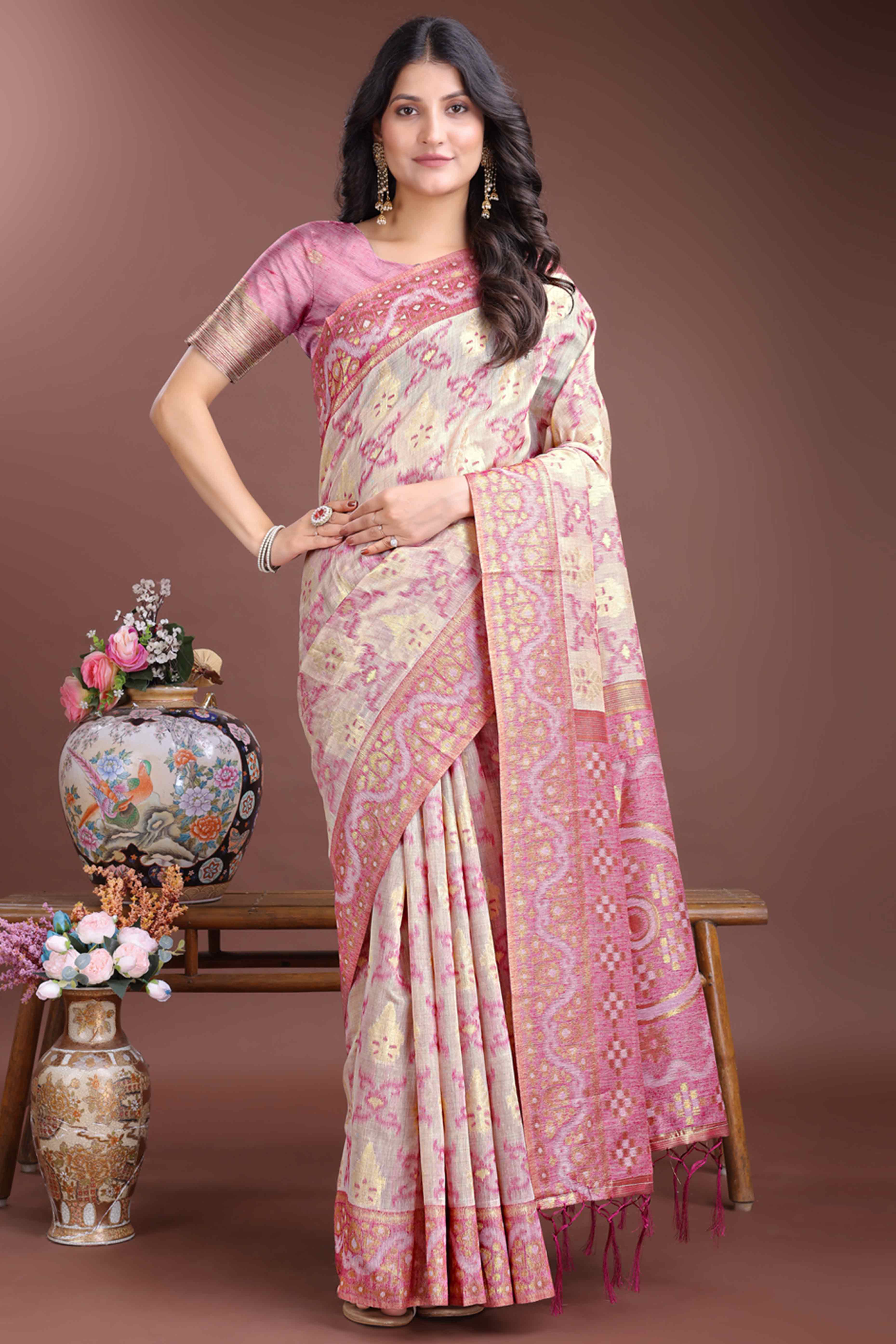Graceful Pink Traditional Ikkat Style Zari Weaving Cotton Blend Saree with Lovely Tassel Accents
