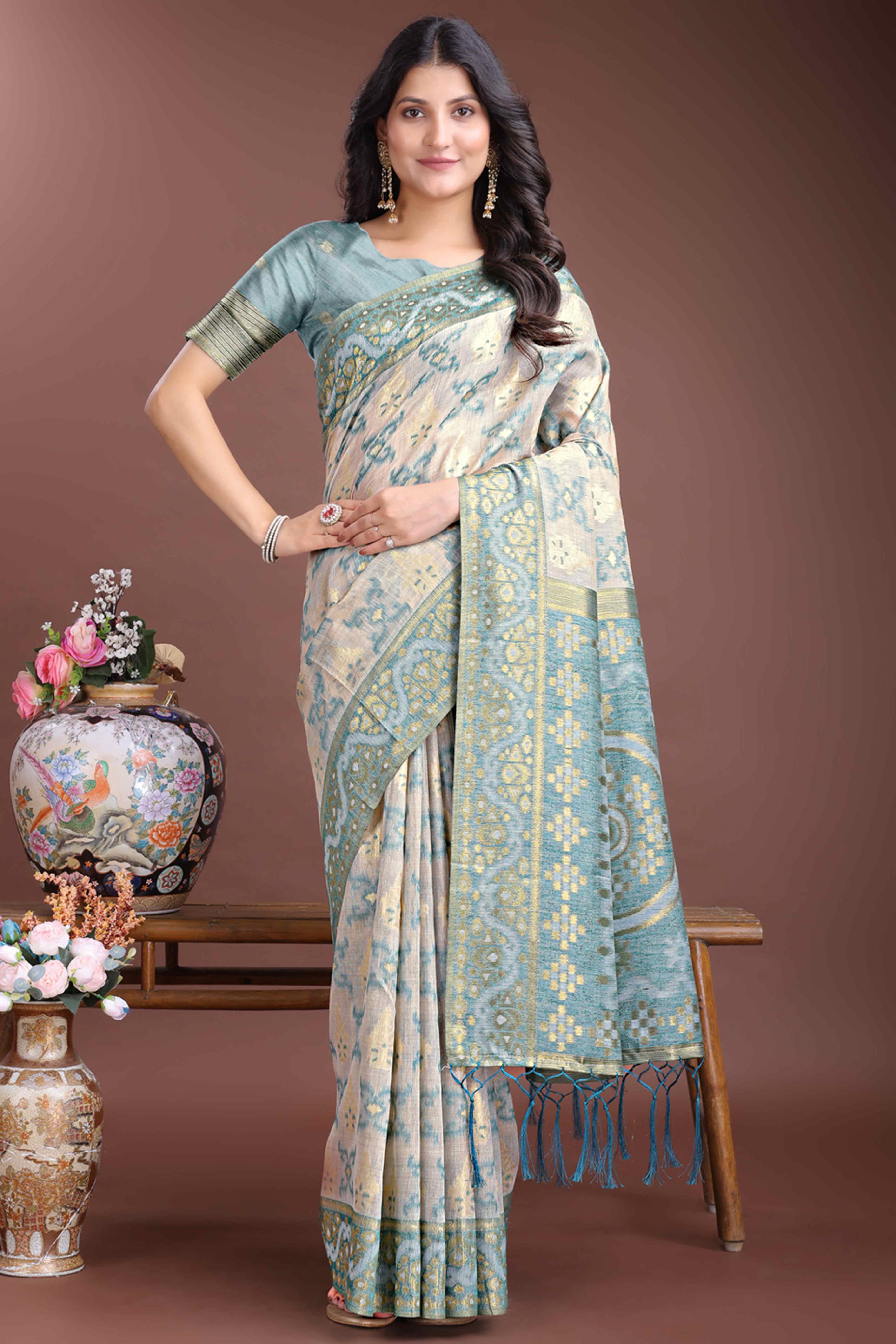 Serene Sea Green Traditional Ikkat Style Zari Weaving Cotton Blend Saree with Artistic Tassel Details