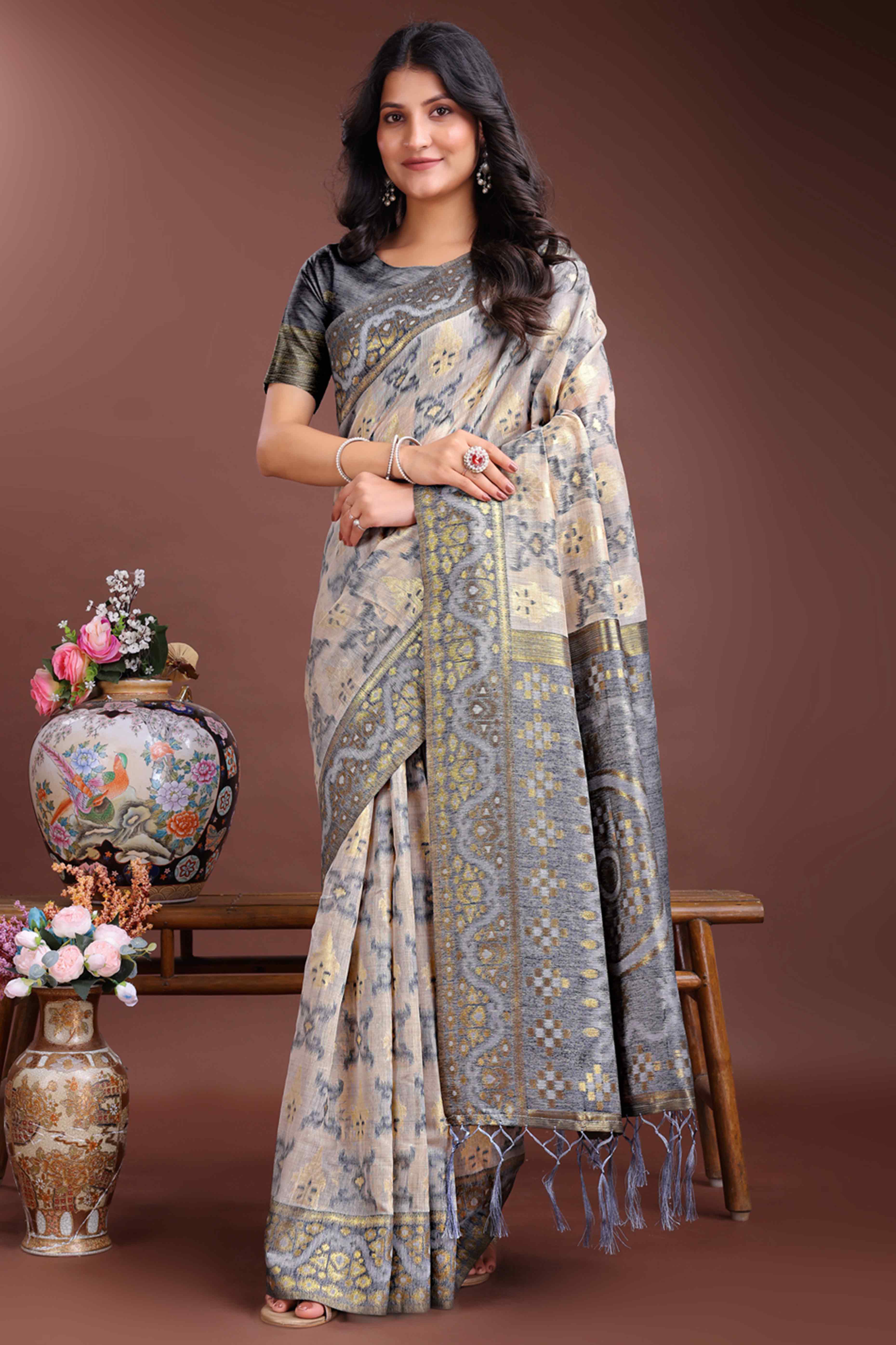 Stylish Grey Traditional Ikkat Style Zari Weaving Cotton Blend Saree with Subtle Tassel Ornaments