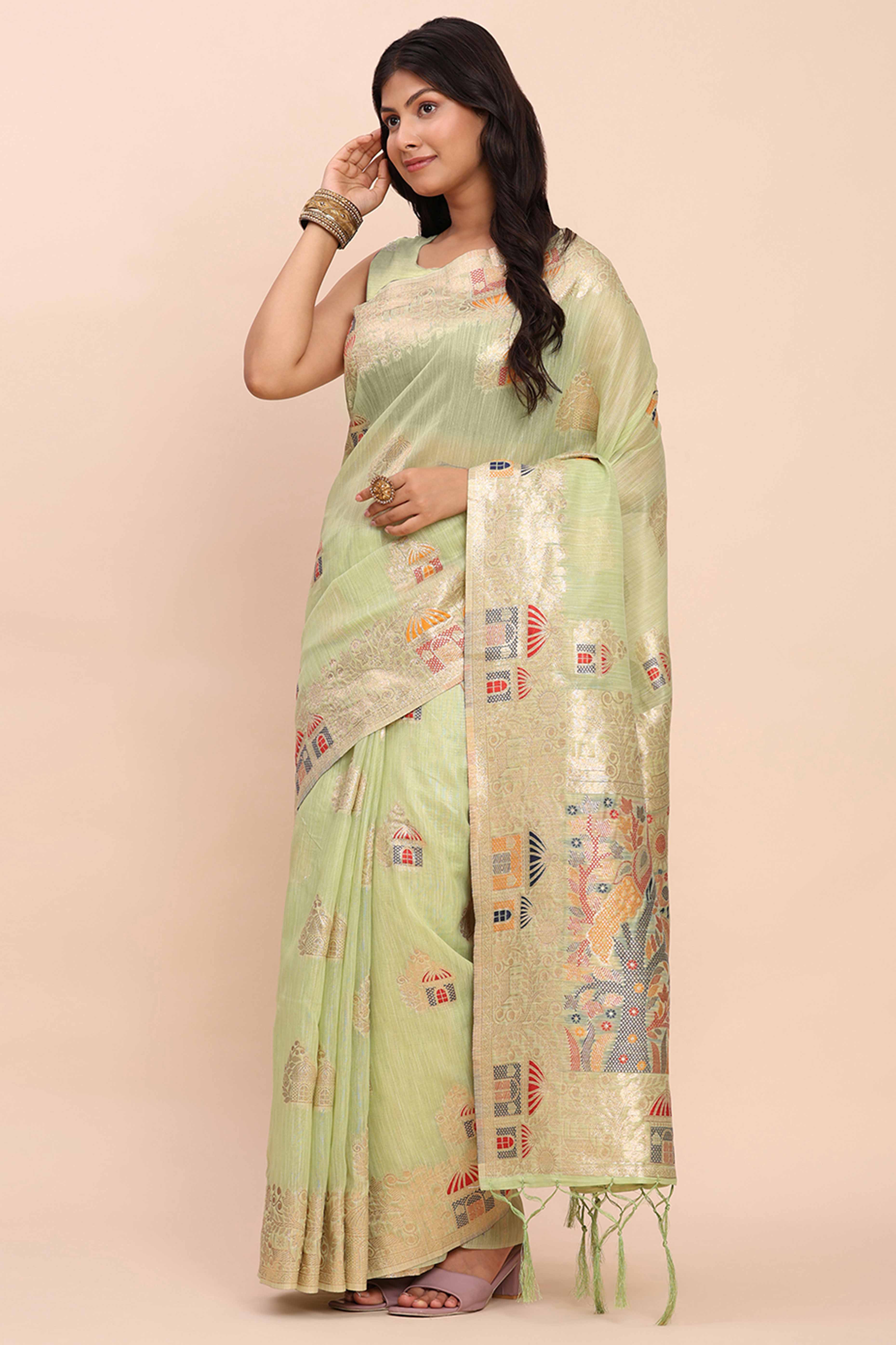 Light Green Bloom Zari Woven Linen Cotton Saree Adorned With Floral Motifs & A Tassel Finish
