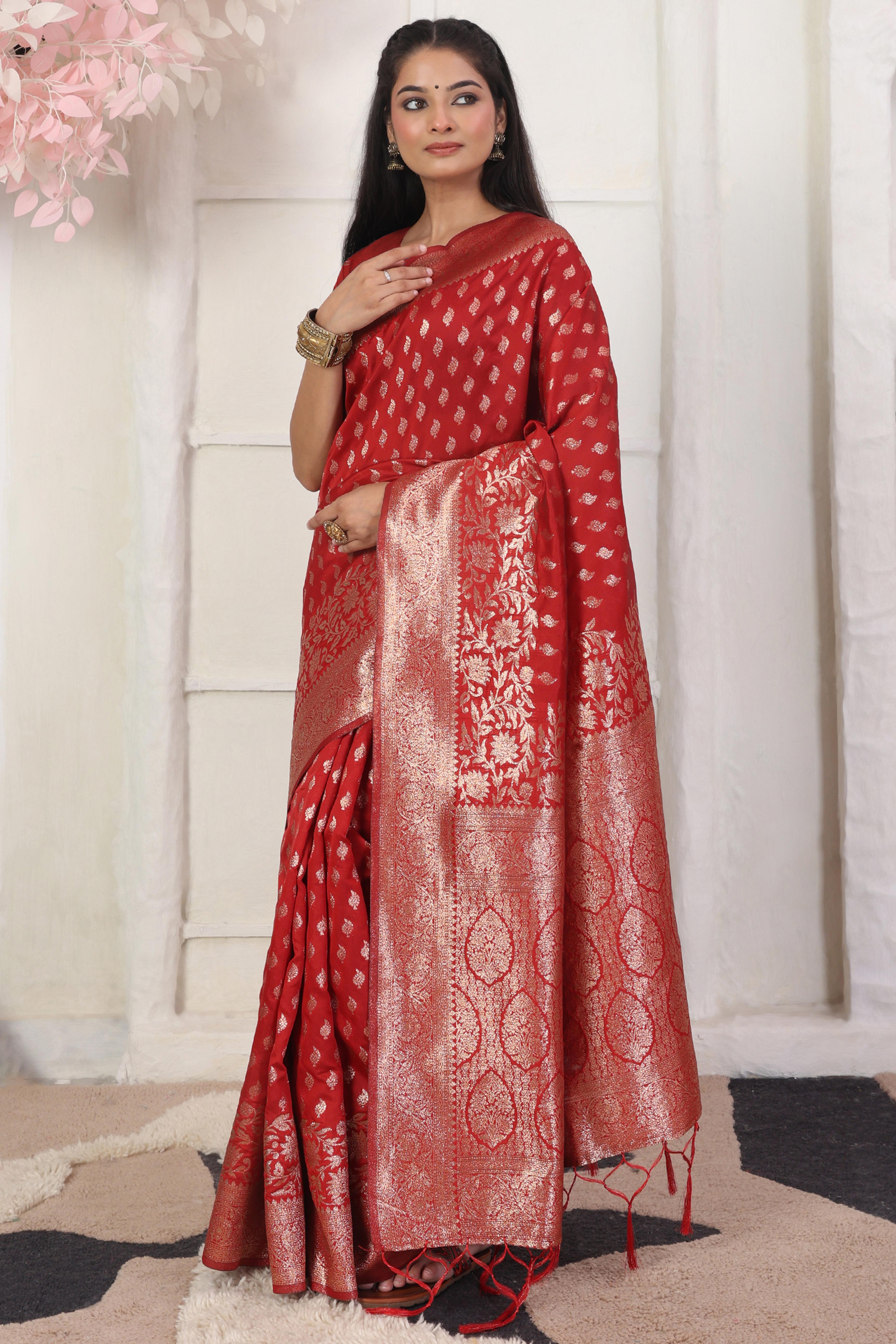 Red Traditional Lichi Silk Blend Saree Enhanced With Floral Zari Weaving & Tassel Pallu