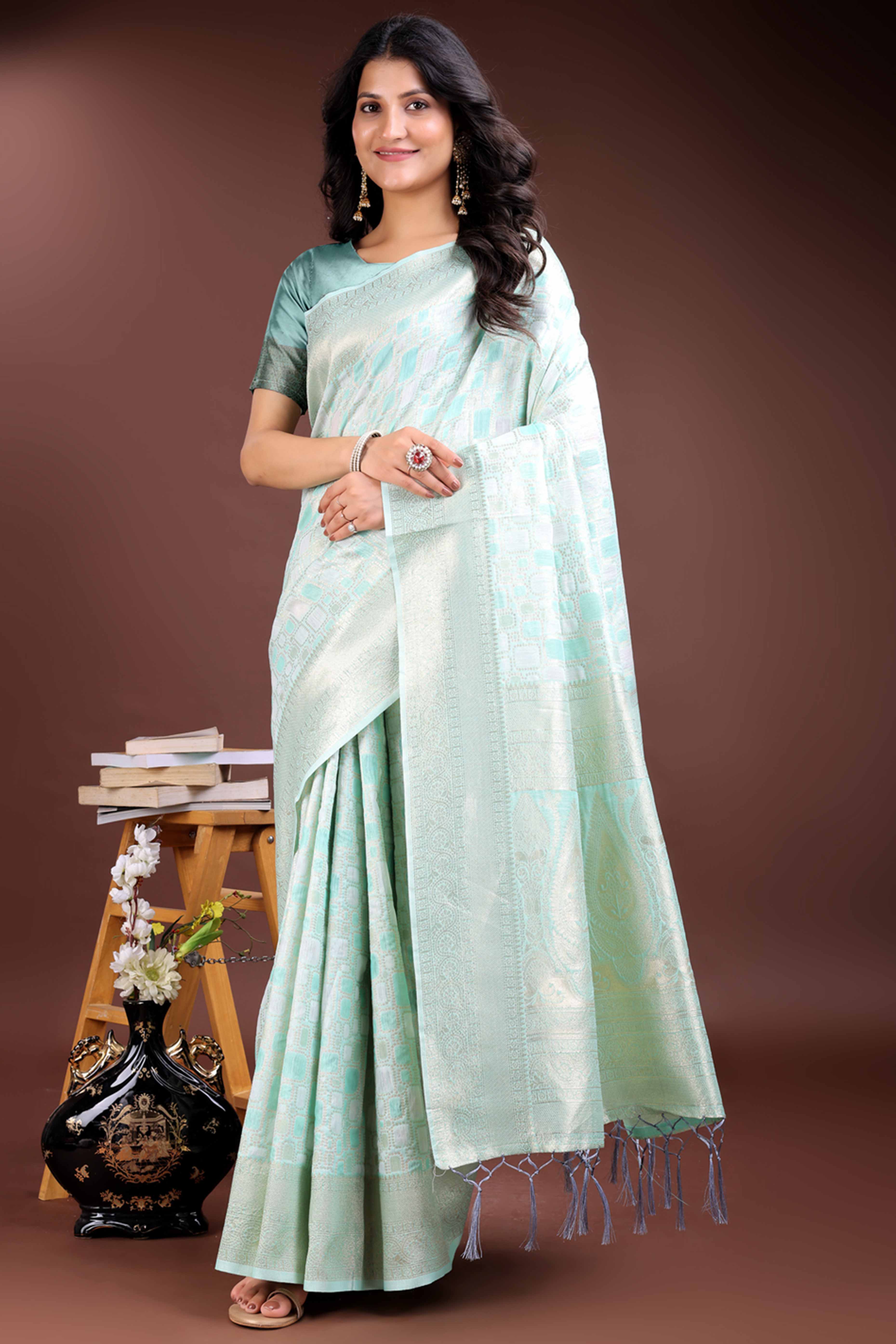Serene Sea Green Geometric Style Zari Weaving Cotton Blend Saree Featuring Artistic Tassels