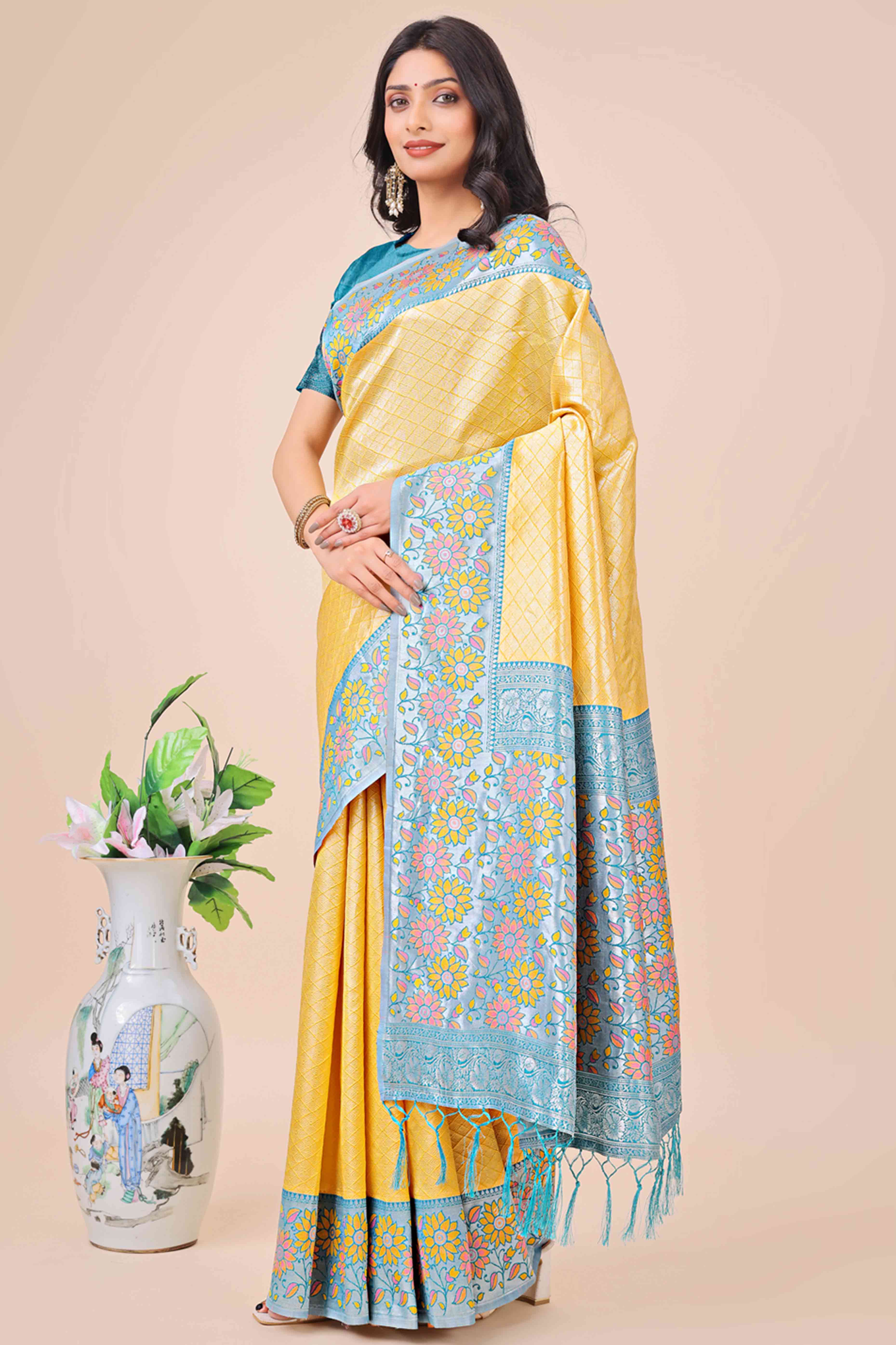 Yellow Lichi Silk Blend Saree With Exquisite Floral Weaving & Graceful Tassel Details