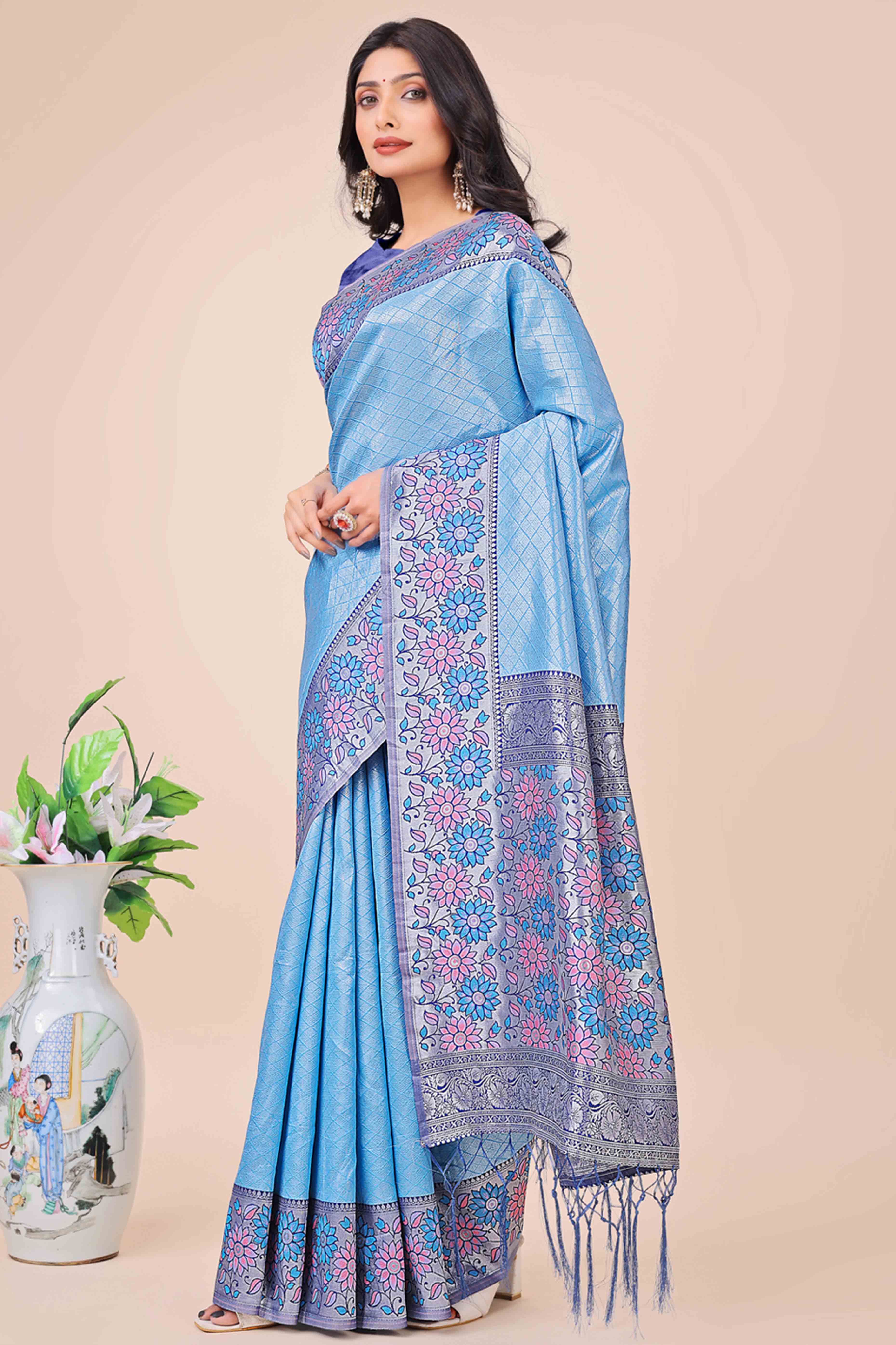 Blue Lichi Silk Blend Saree With Exquisite Floral Weaving & Graceful Tassel Details