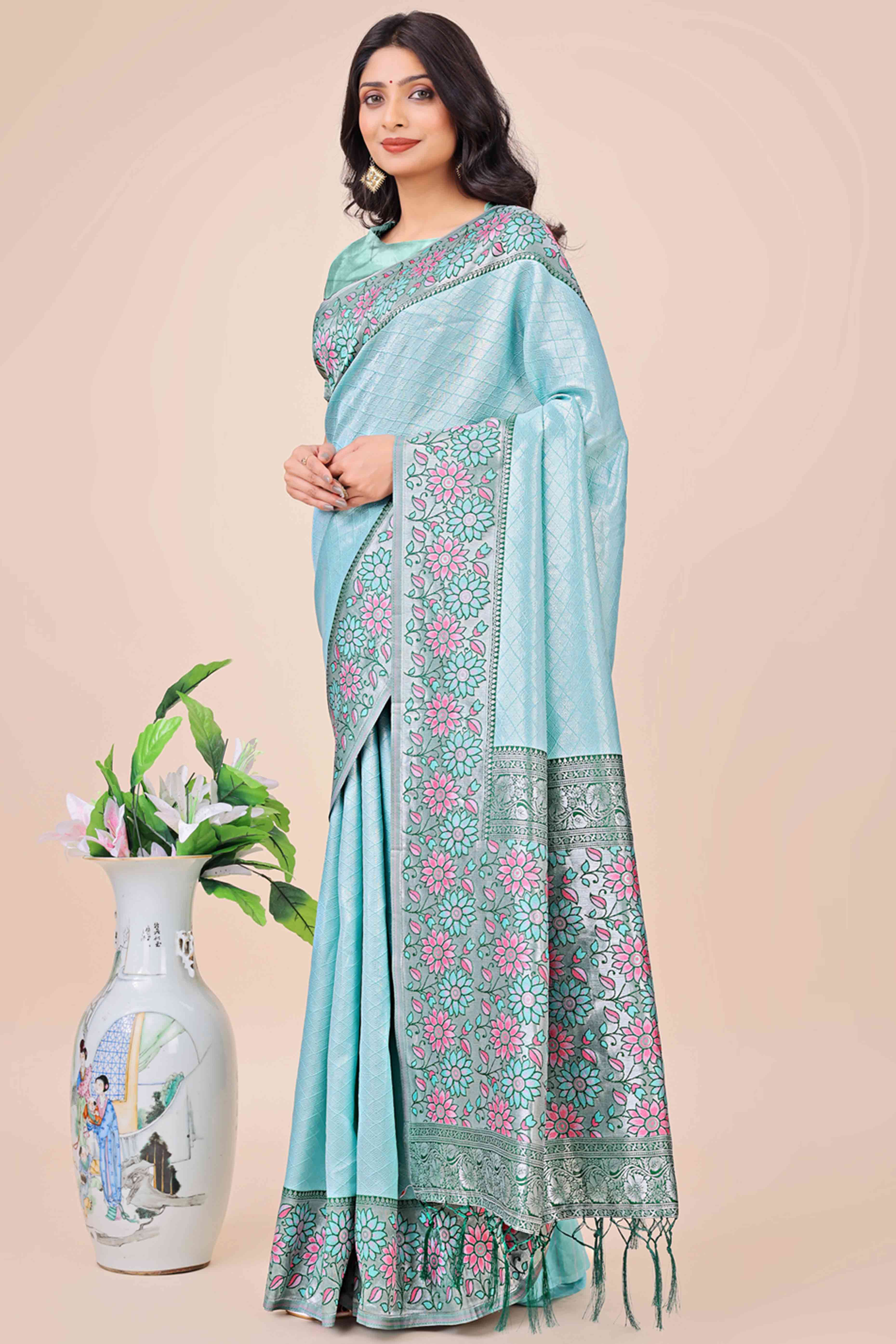 Light Blue Lichi Silk Blend Saree With Exquisite Floral Weaving & Graceful Tassel Details