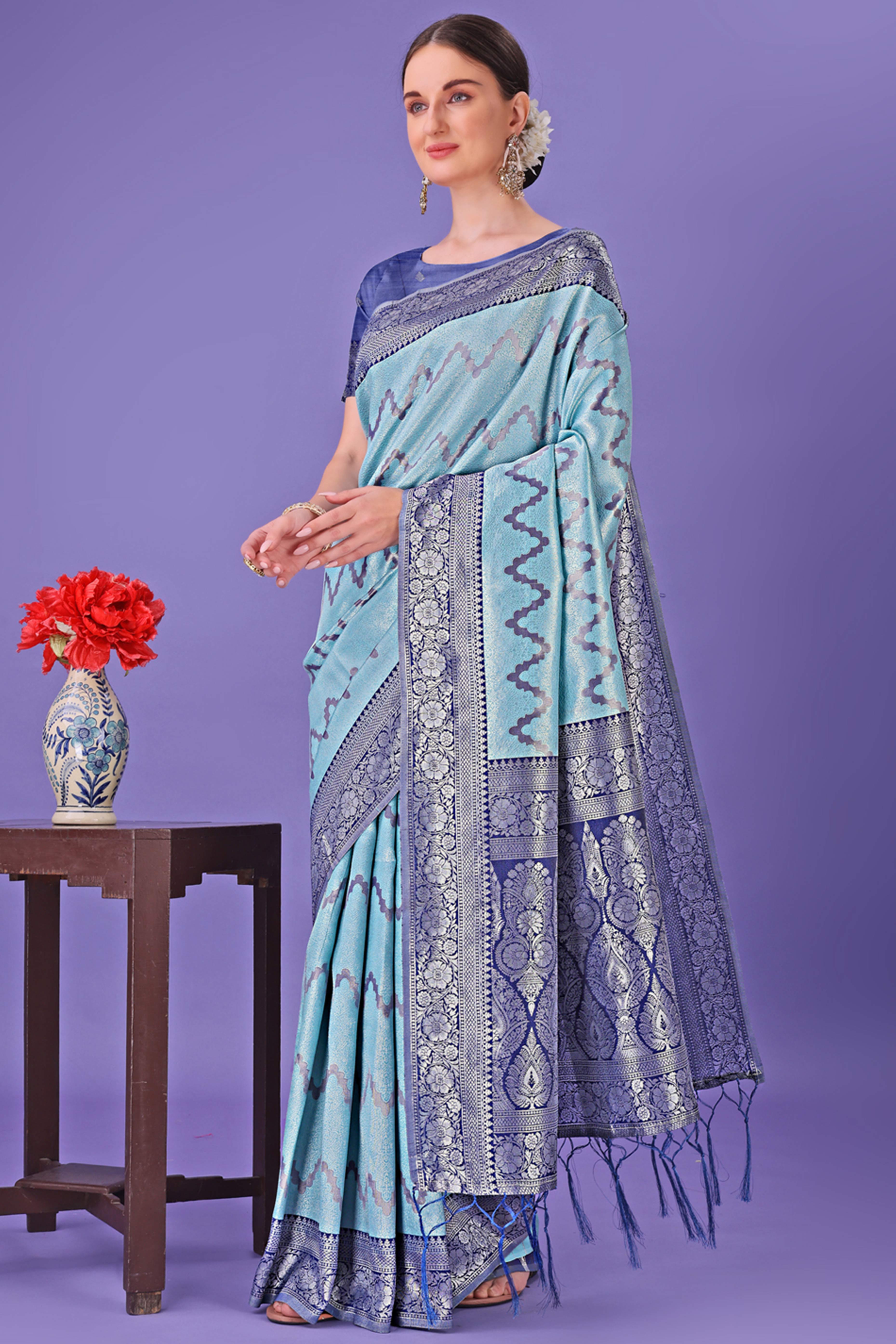 Sky Blue Lichi Cotton Silk Saree Adorned With Floral Zari Weave & Tassels