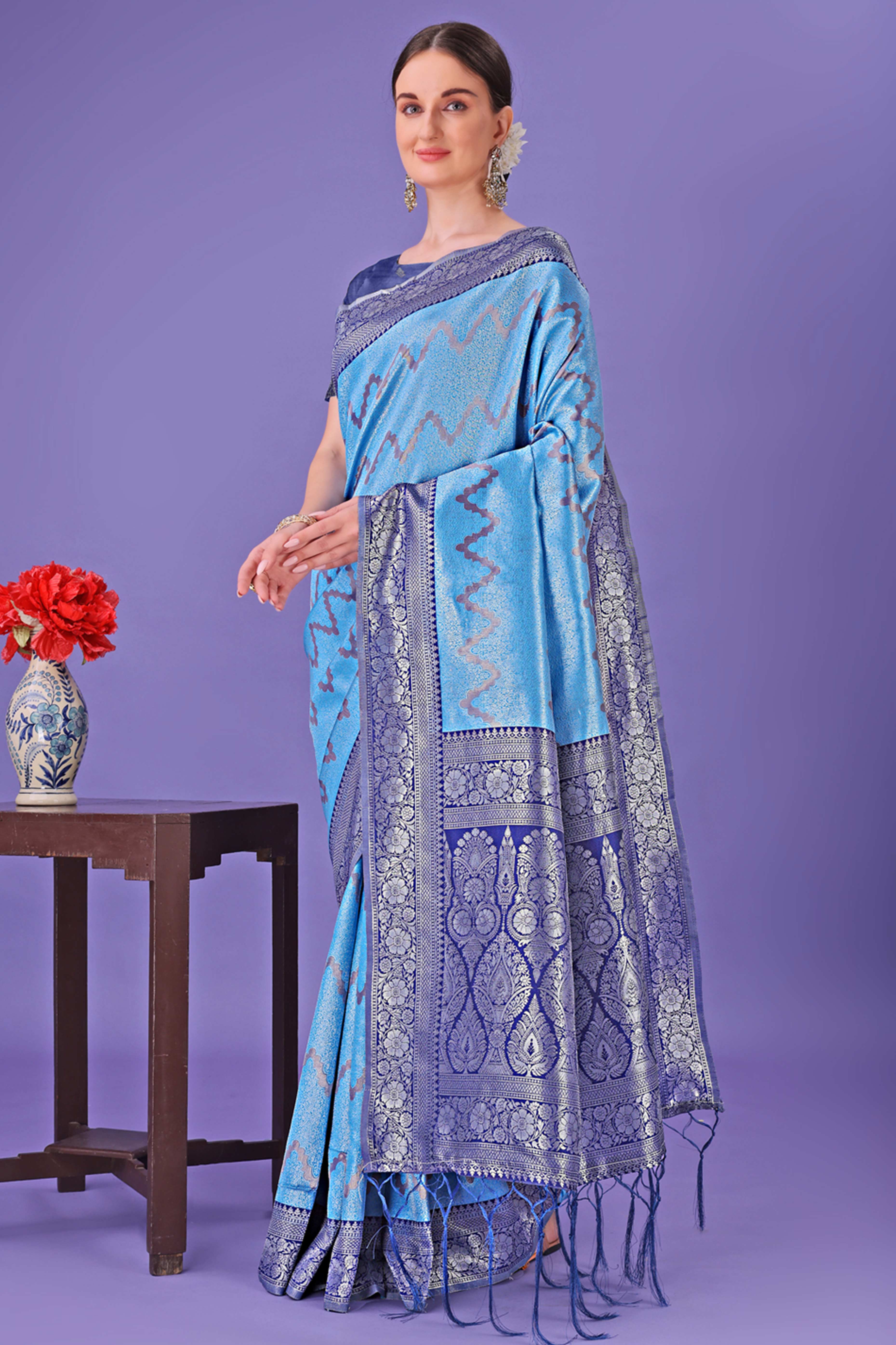 Blue Lichi Cotton Silk Saree Adorned With Floral Zari Weave & Tassels