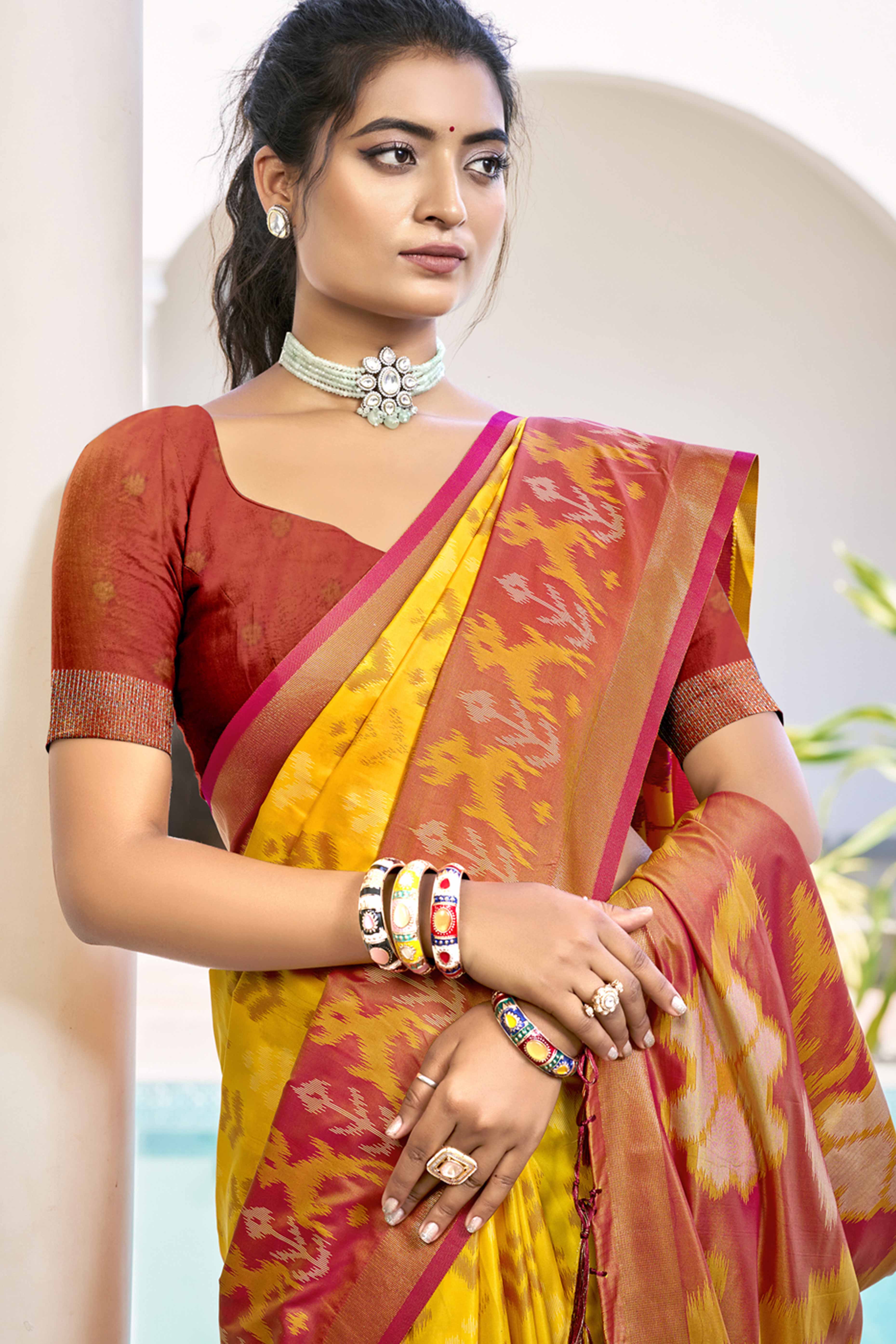 Mustard Yellow Ikat Woven Silk Saree for Festive Celebrations