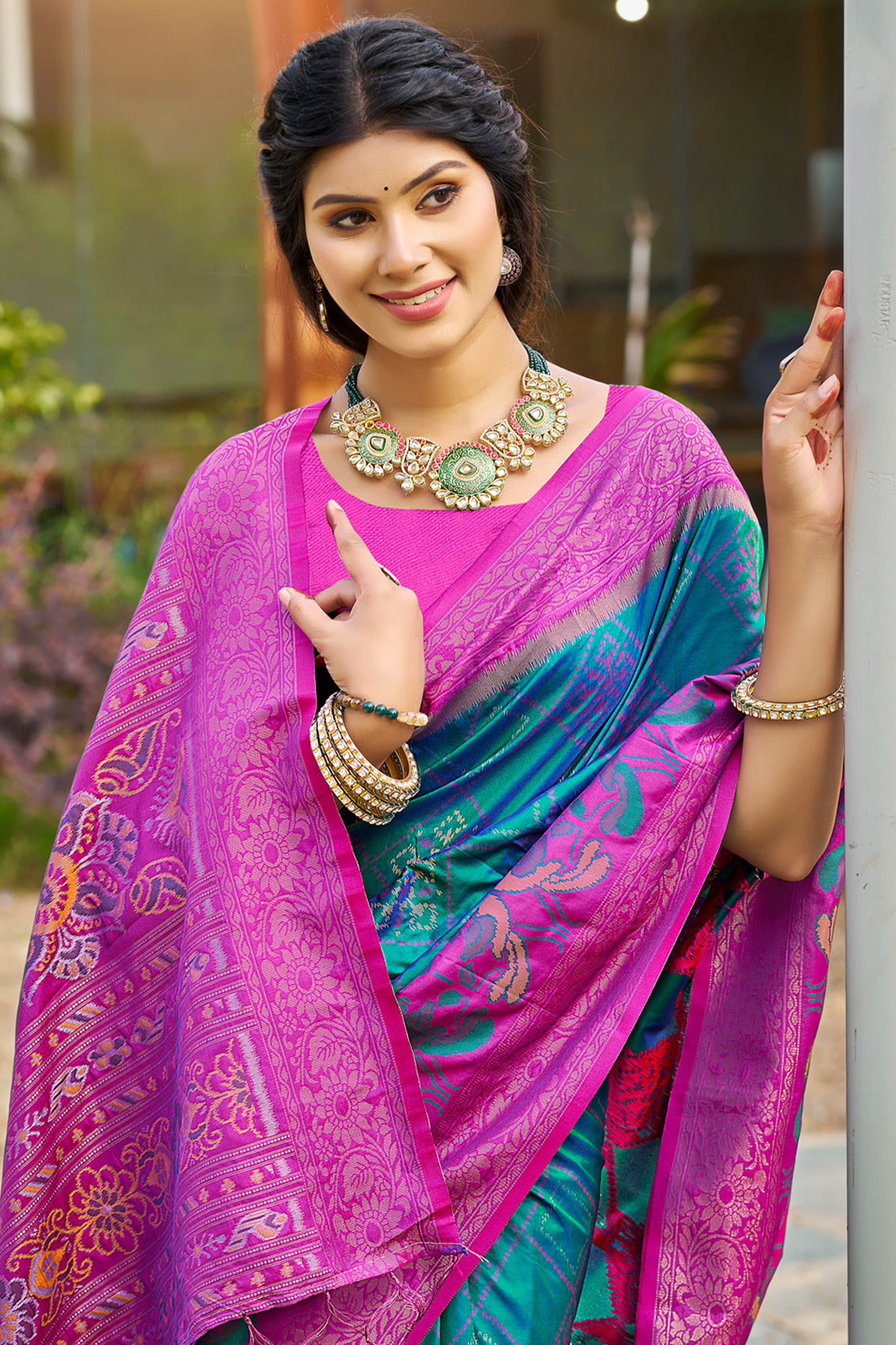 Graceful Morpich Blue Pochampally Silk Blend Saree Adorned With Floral Weaving & Tassel Pallu