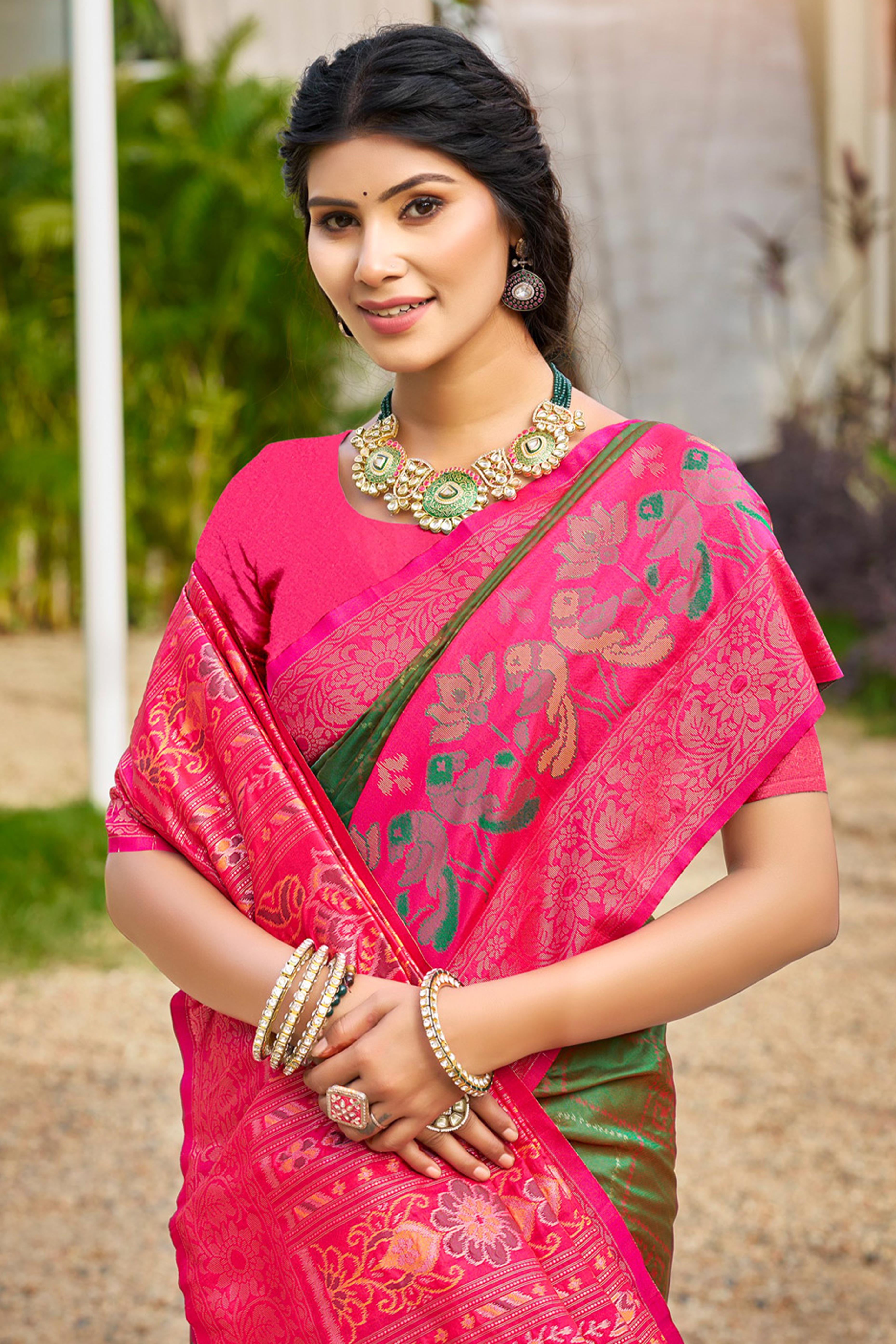 Graceful Mehendi Green Pochampally Silk Blend Saree Adorned With Floral Weaving & Tassel Pallu