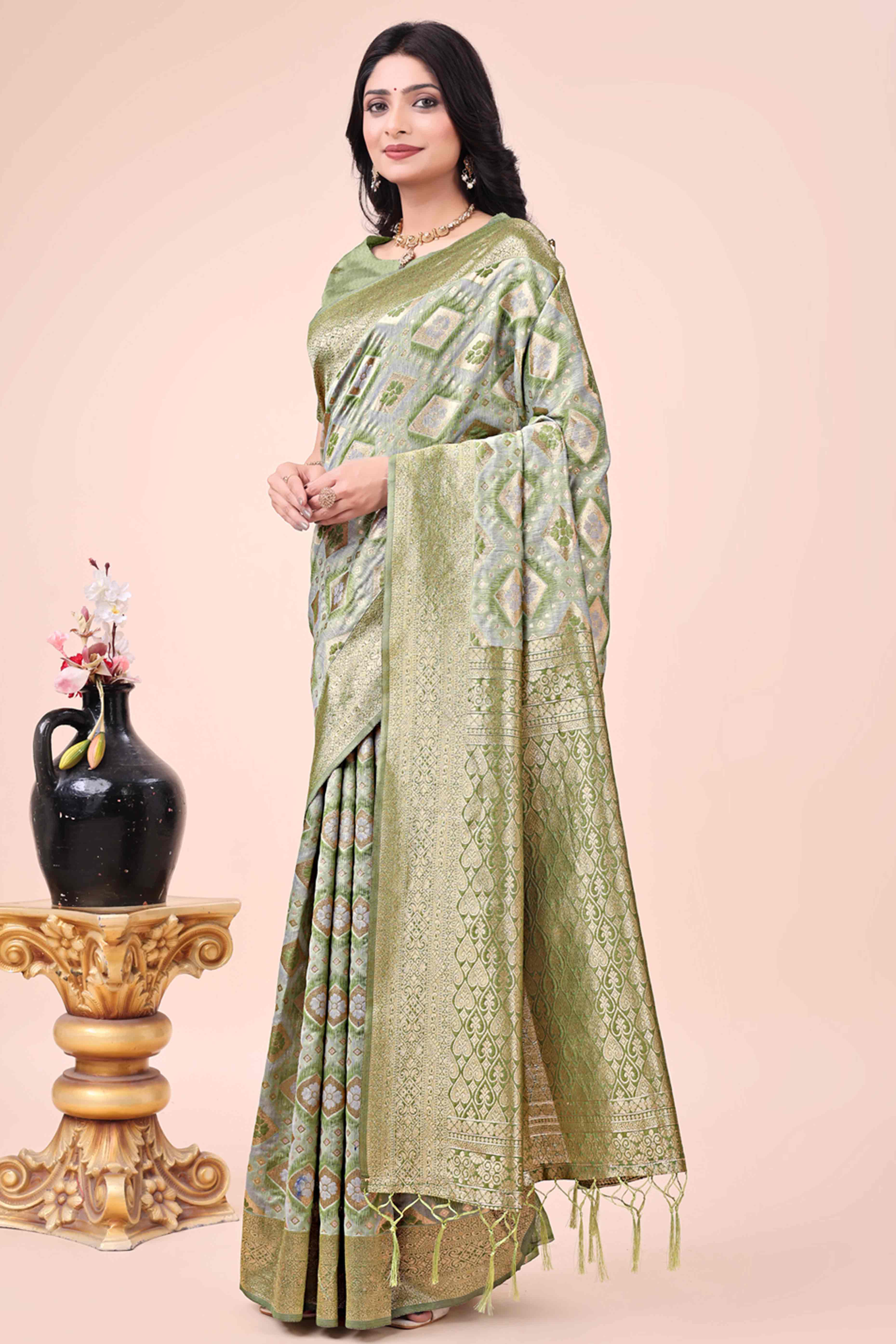 Floral Weaving On Mehendi Green Cotton Blend Saree With Tassels