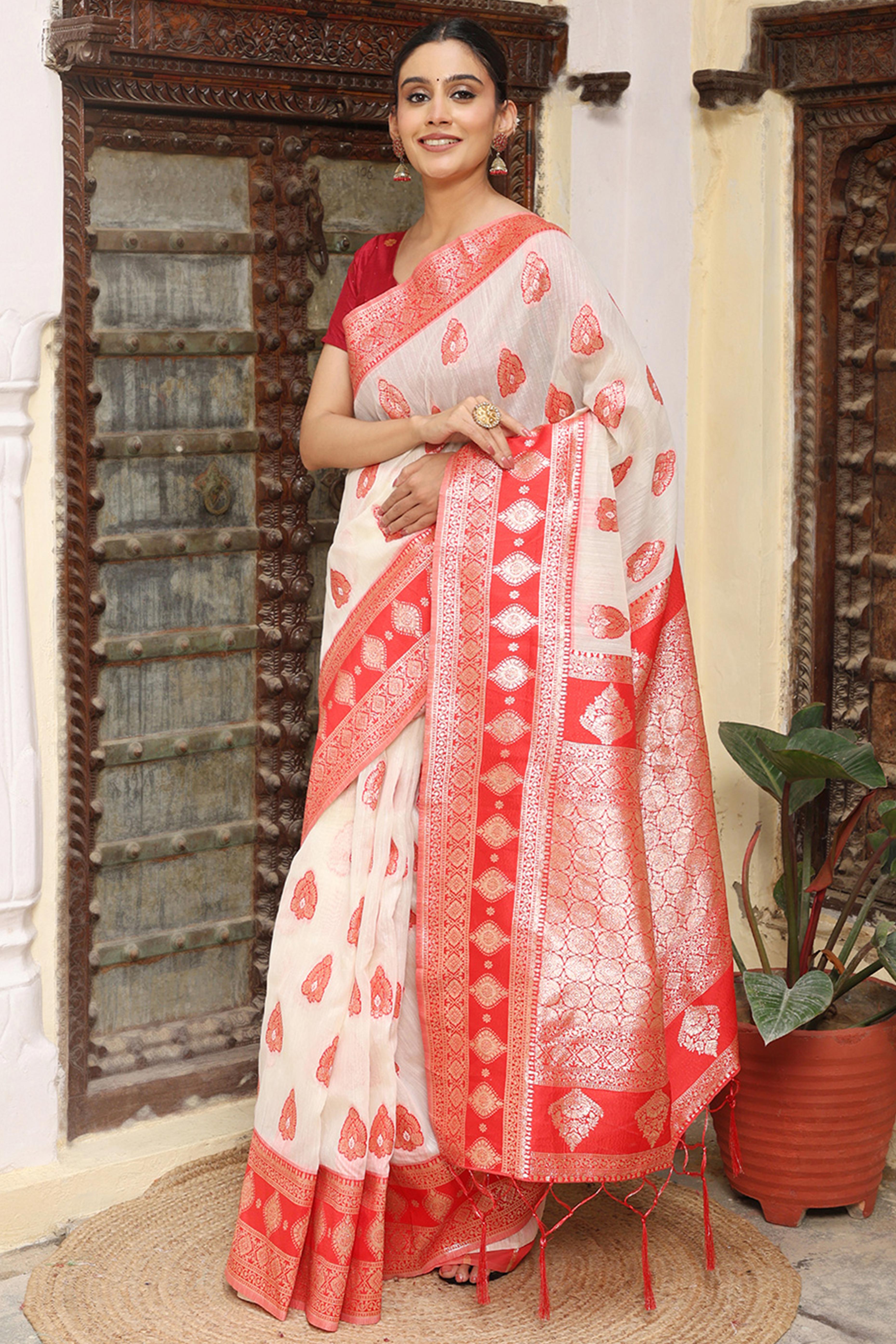 Elegant White Saree in Linen Cotton Fabric Adorned with Red Border and Zari Weaving