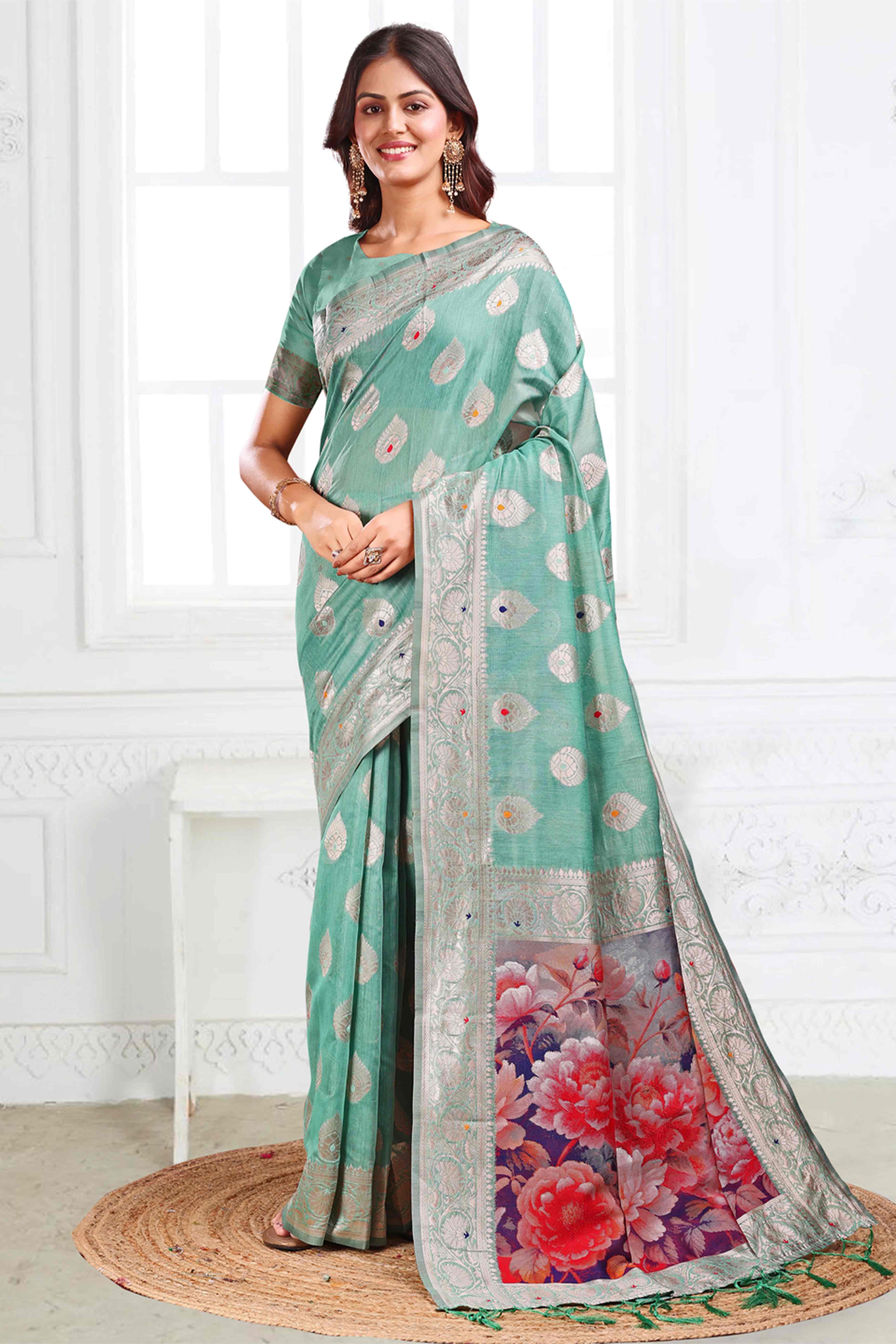 Turquoise Linen Cotton Silk Saree Adorned With Intricate Floral Zari Weaving & Tassel Pallu
