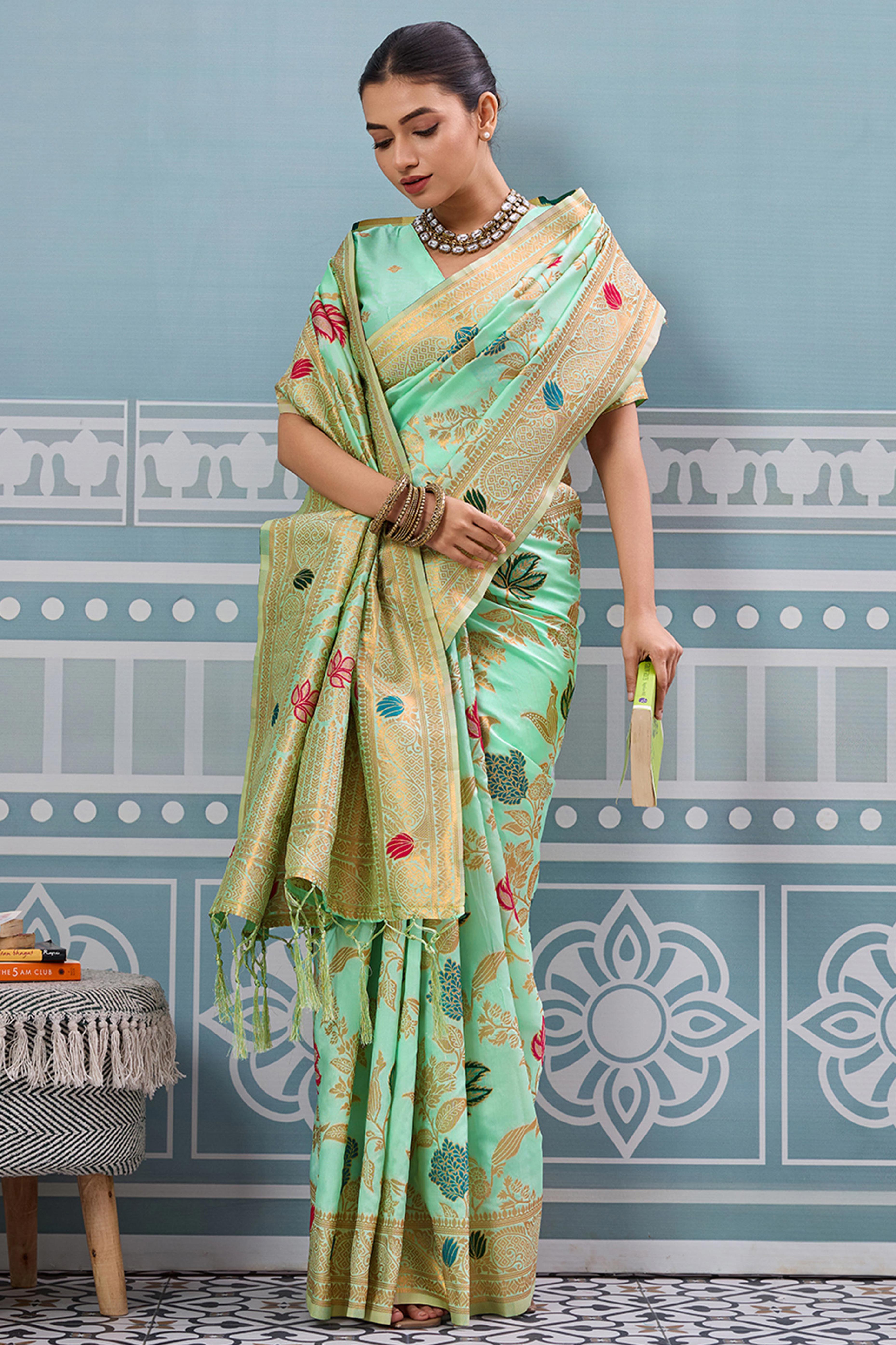 Radiant Sea Green Silk Blend Saree Adorned With Intricate Floral Zari Weaving & Tassel Pallu