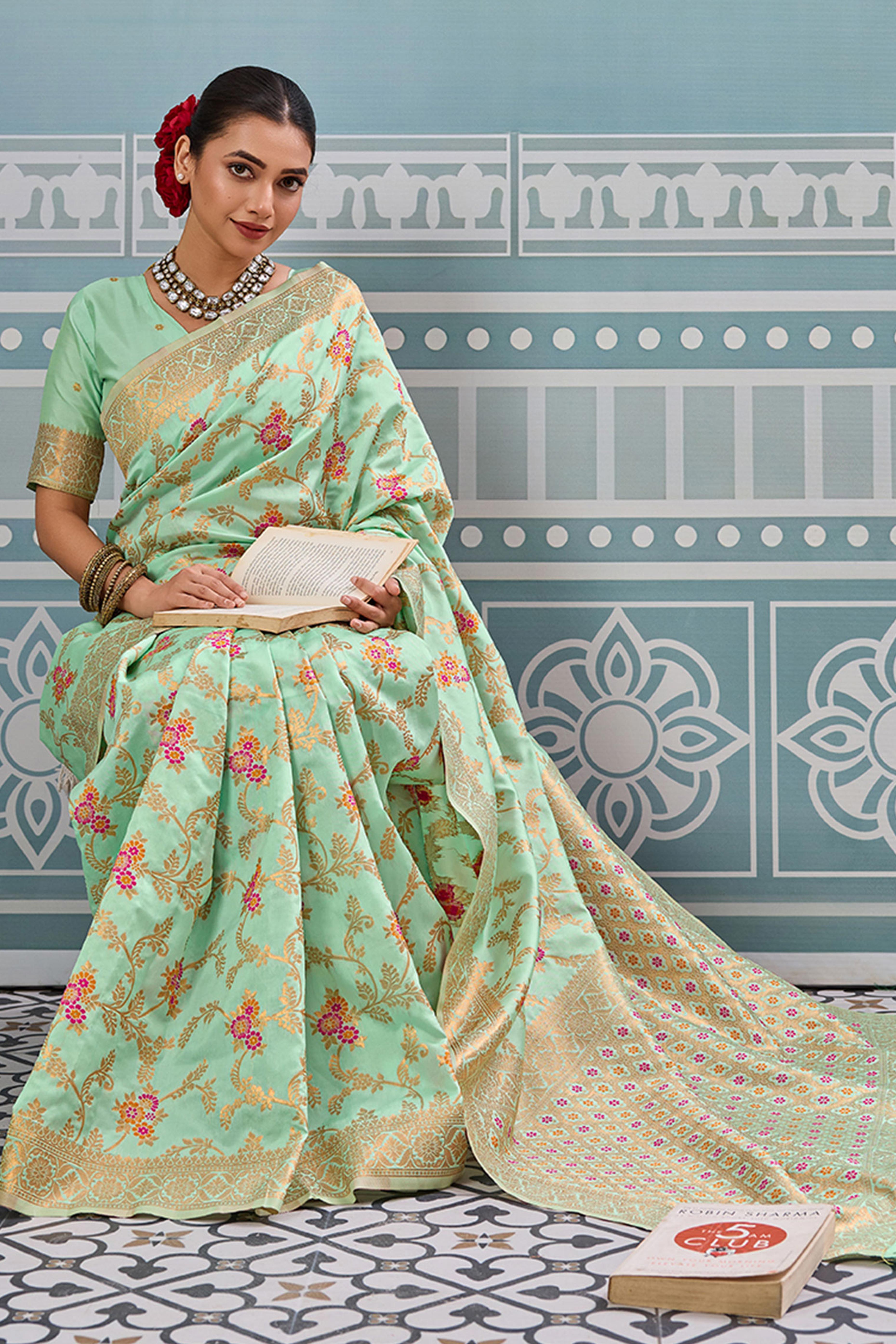 Majestic Bloom Sea Green Floral Zari Weaving Silk Blend Saree With Elegant Tassel Pallu
