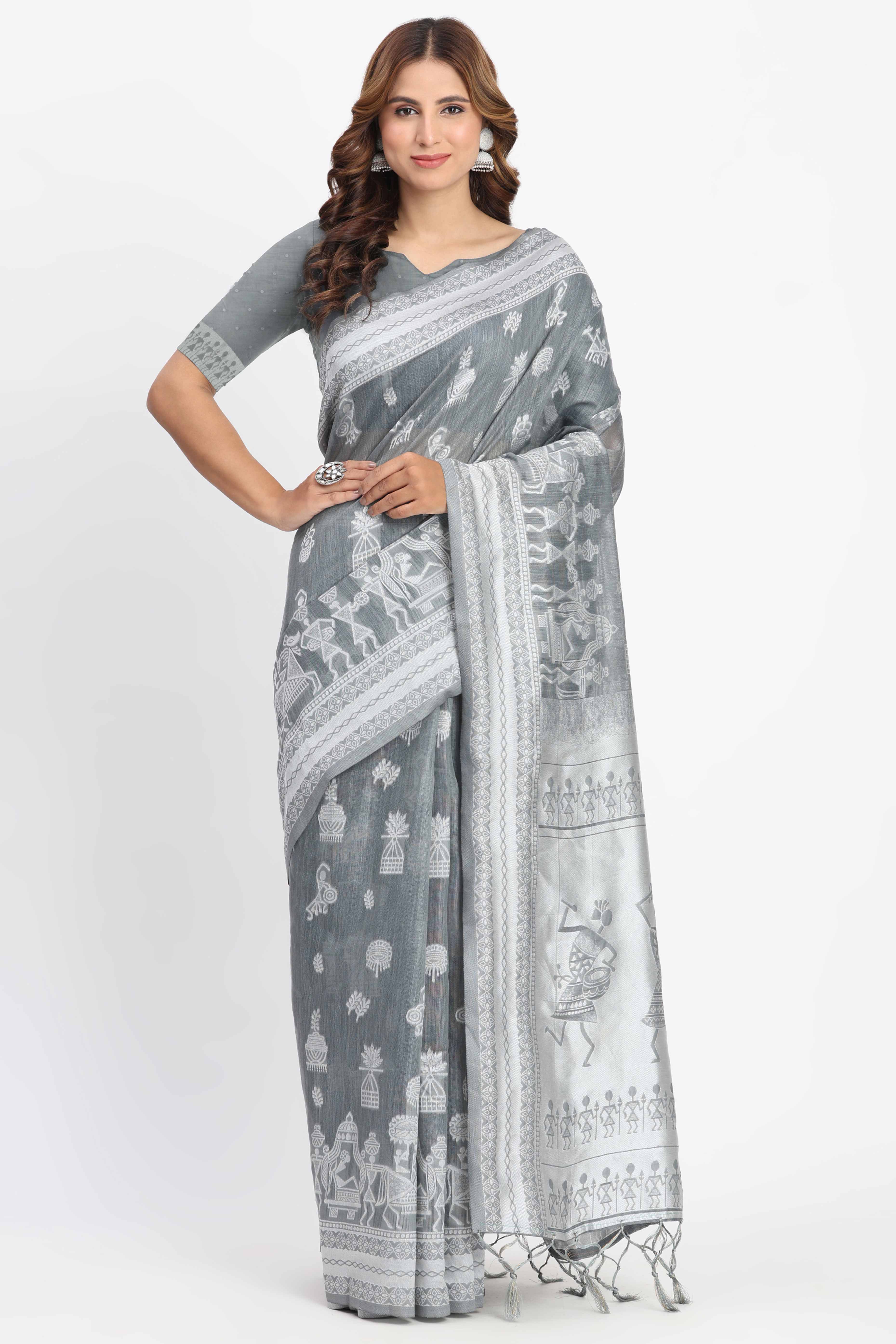 Grey Linen Cotton Saree Showcasing Traditional Warli Motifs In Zari Weaving With Tassel Pallu