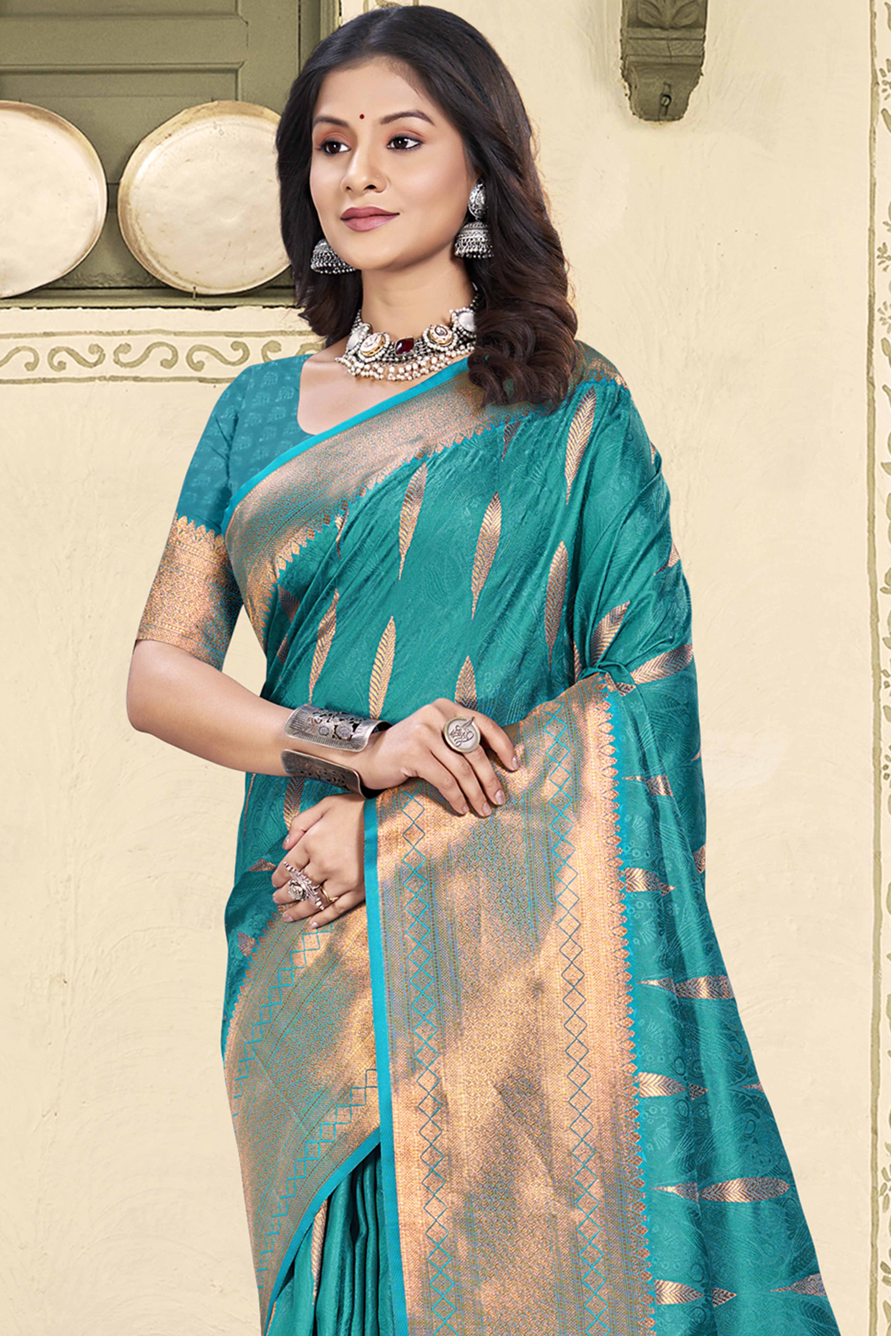 Regal Teal Blue Silk Blend Saree Enhanced With Floral Zari Work & Tassel Finish