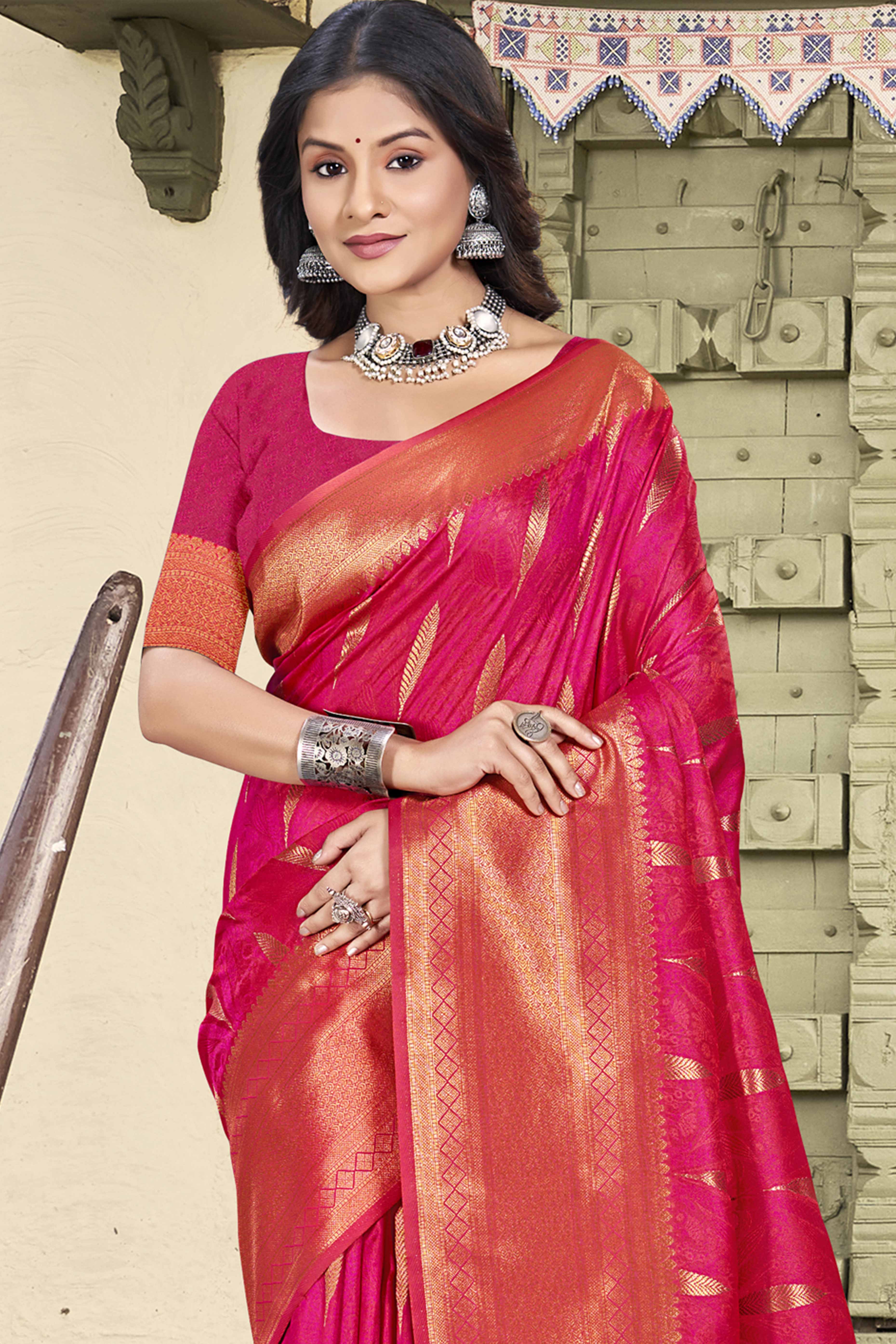 Charming Rani Pink Floral Zari Weaving Saree In Lustrous Silk Blend With Tassel Detail